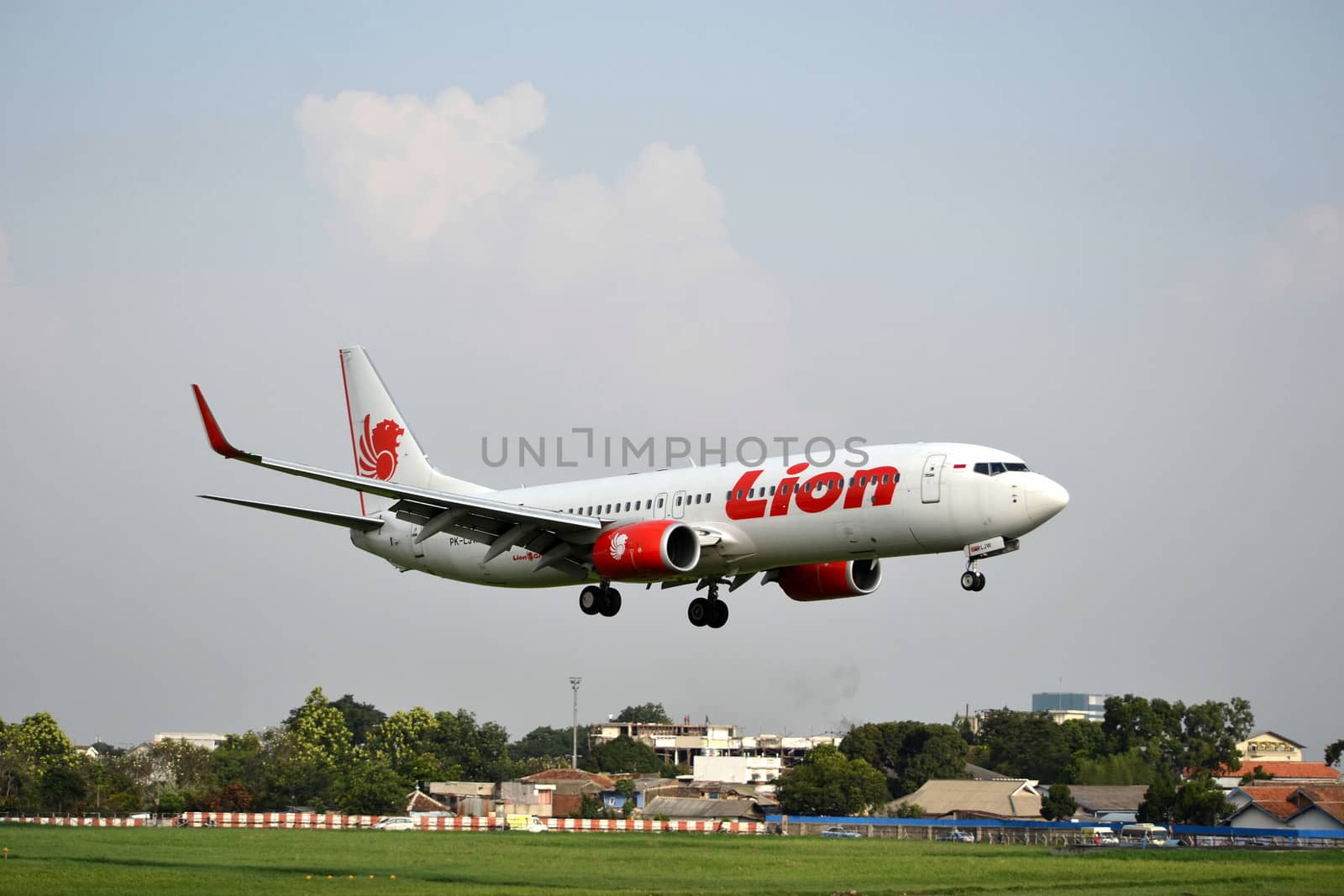 bandung, indonesia-june 16, 2014: Lion Air airplane taking manoeuvre on husein sastranegara airport bandung.