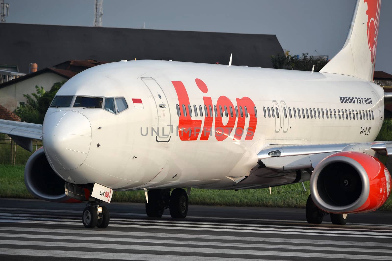 bandung, indonesia-june 16, 2014: Lion Air airplane taking manoeuvre on husein sastranegara airport bandung.