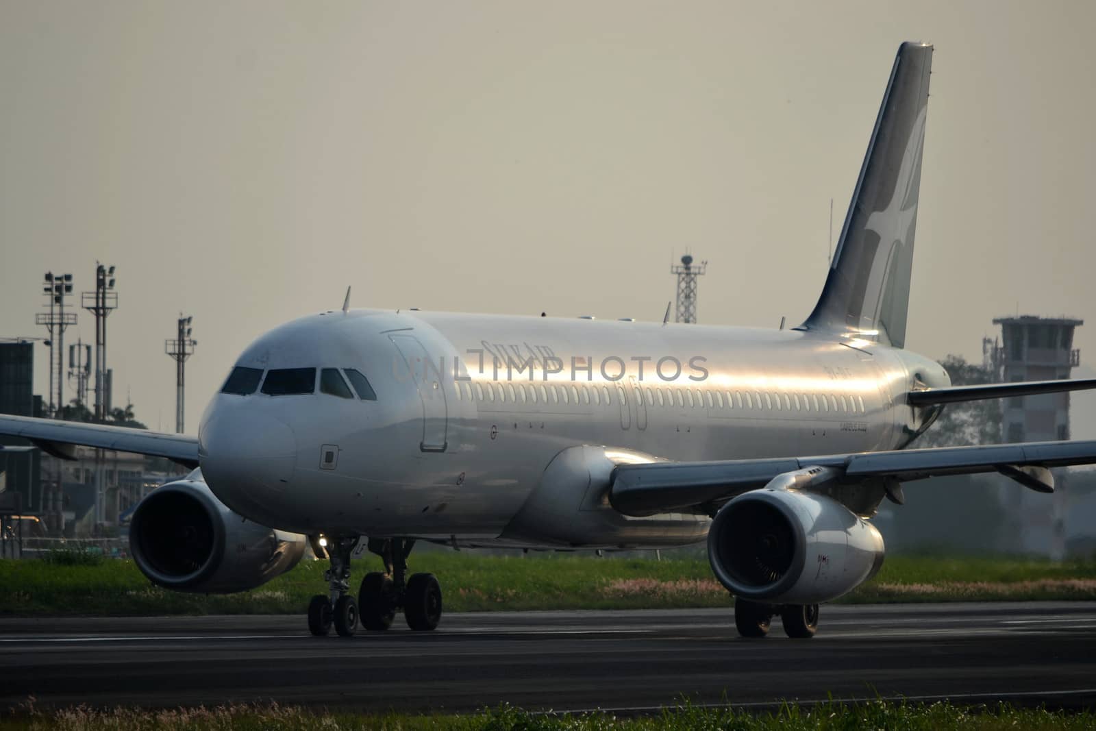 bandung, indonesia-june 16, 2014: Silk Air airplane taking manoeuvre on husein sastranegara airport bandung.