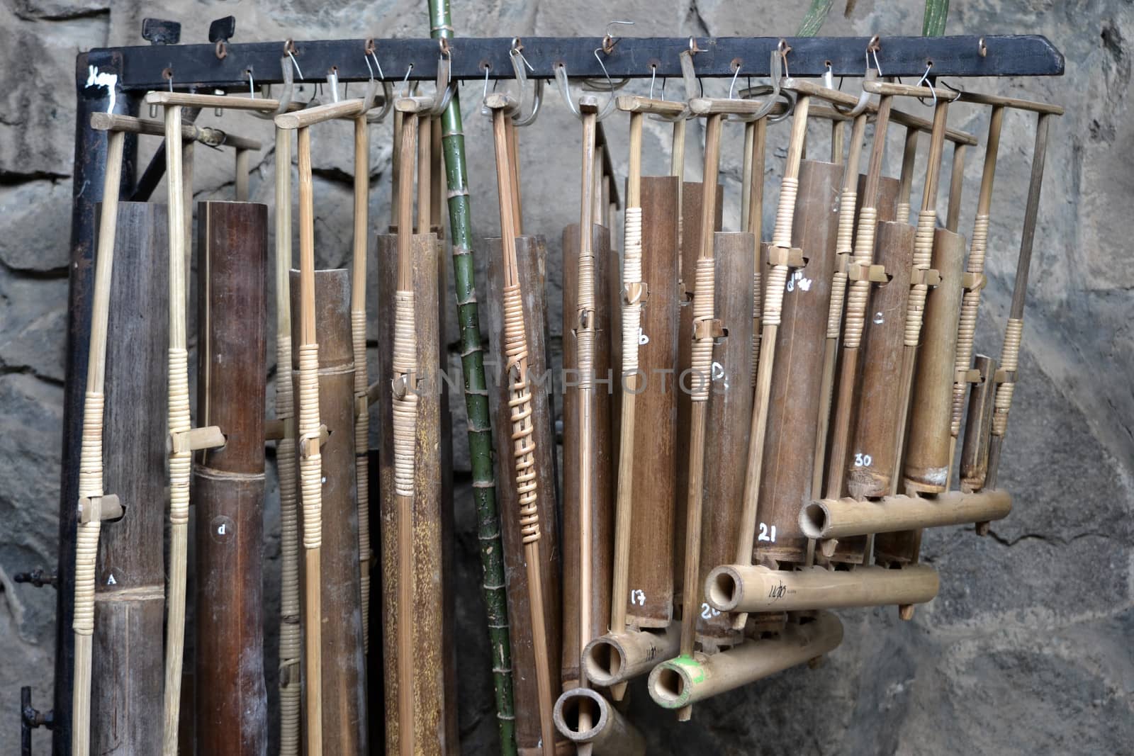 angklung is traditional musical heritage made from bamboo and worldwide recognize originally from indonesia