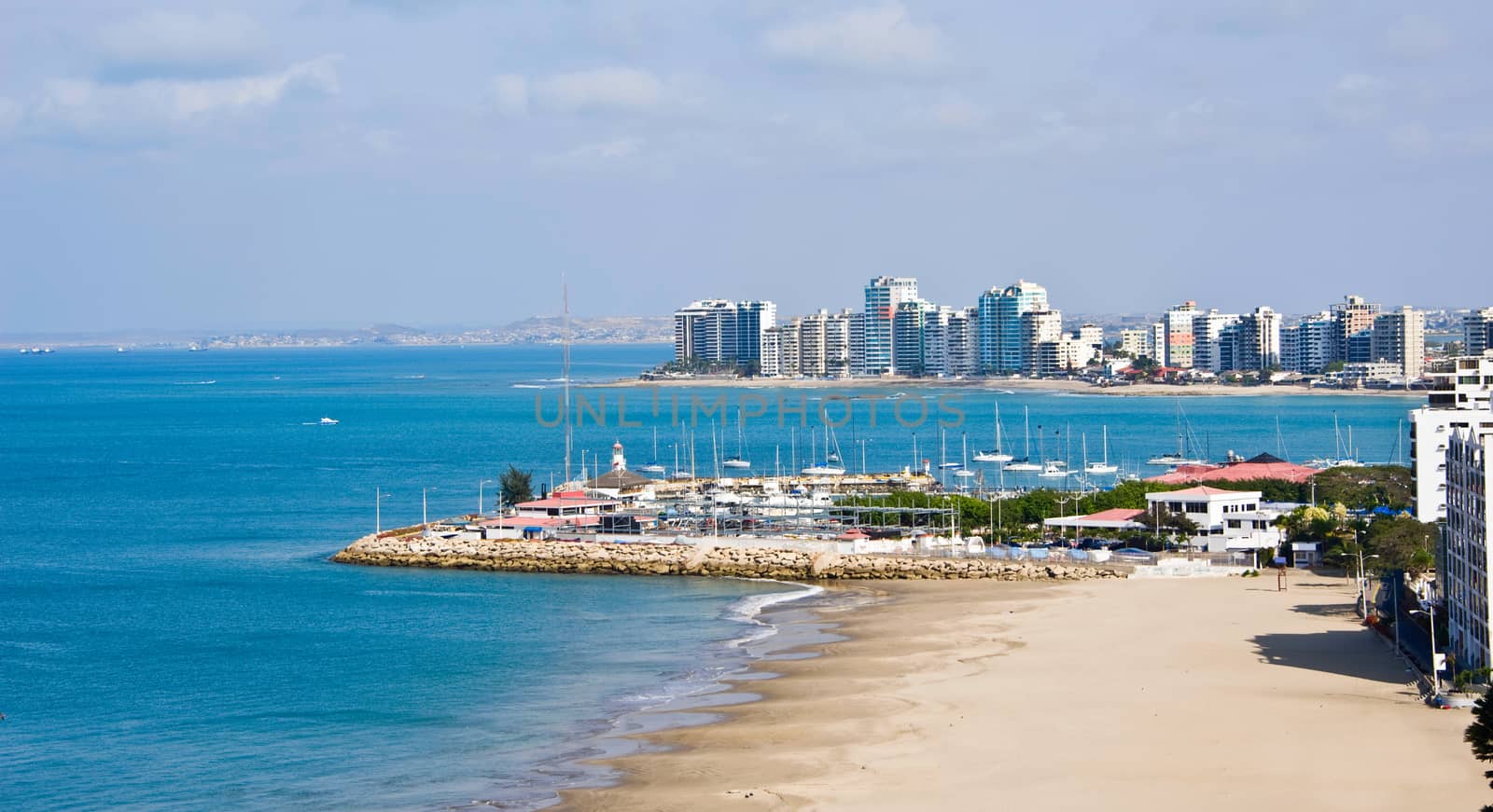 Salinas beach with apartment buildings and yacht club in Ecuador, Pacific Coast