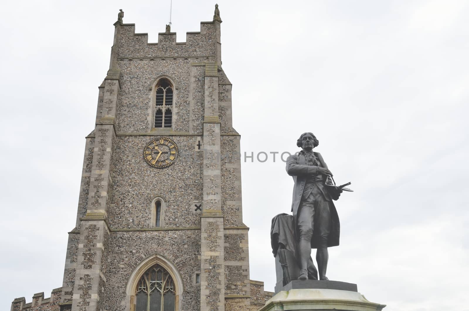 Church and statue at sudbury suffolk by pauws99