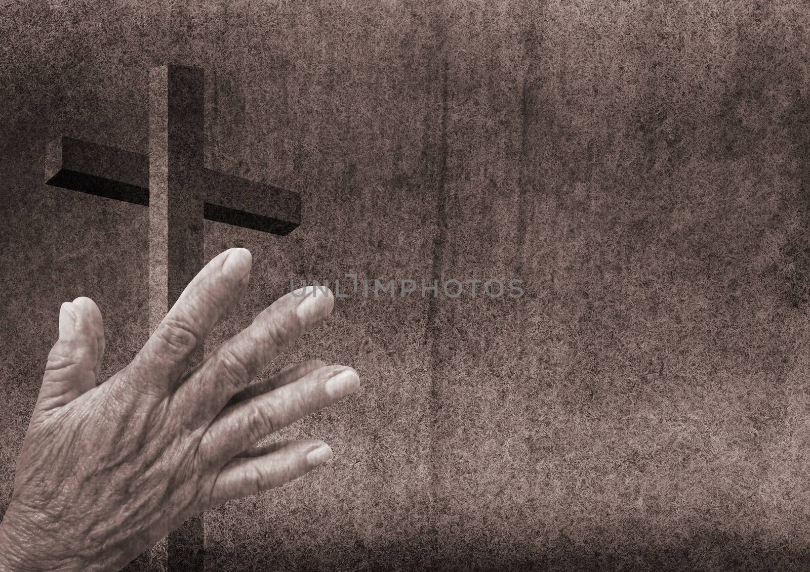 Praying hands and christian cross