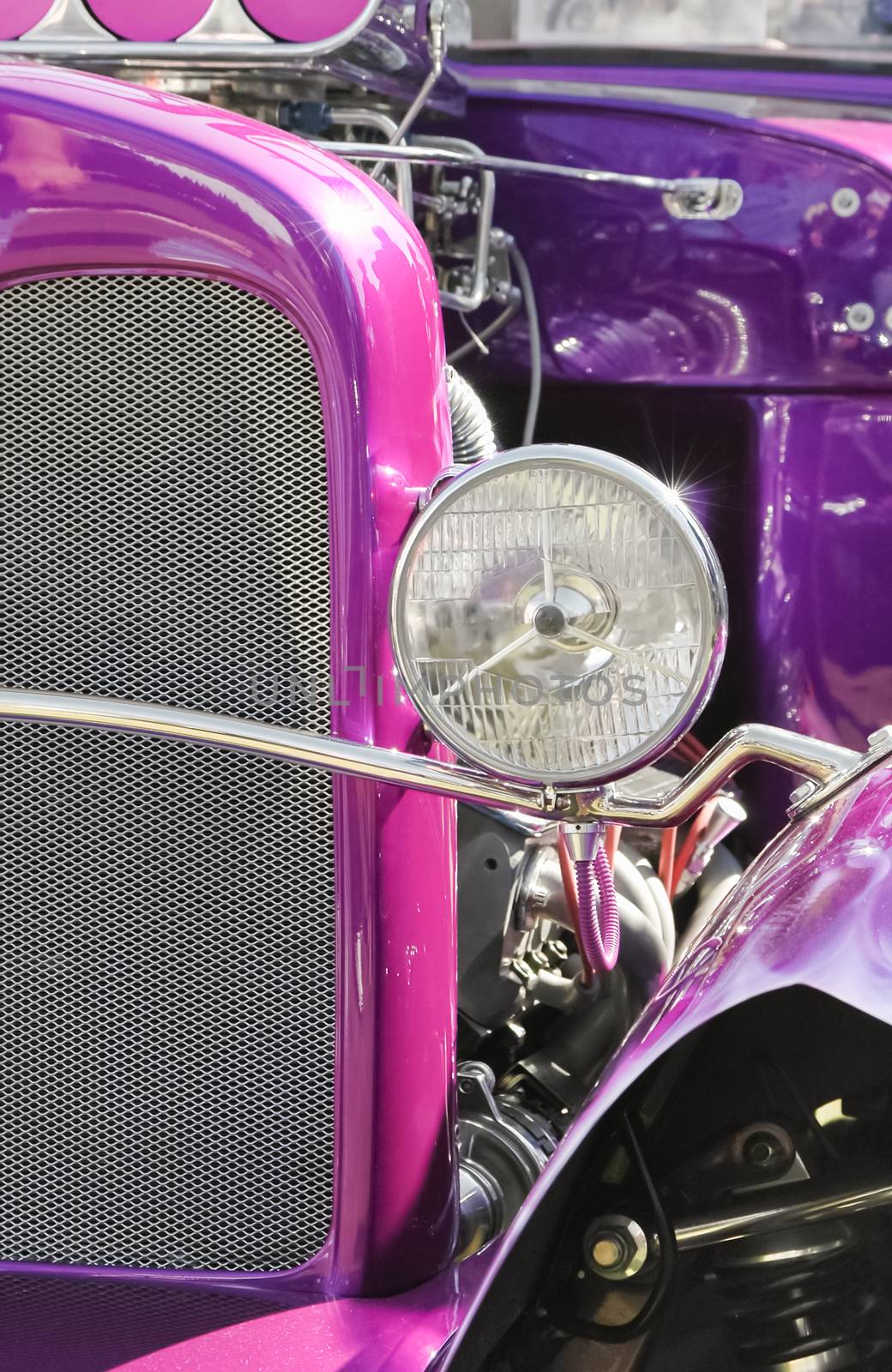 purple hot-rod with exposed engine