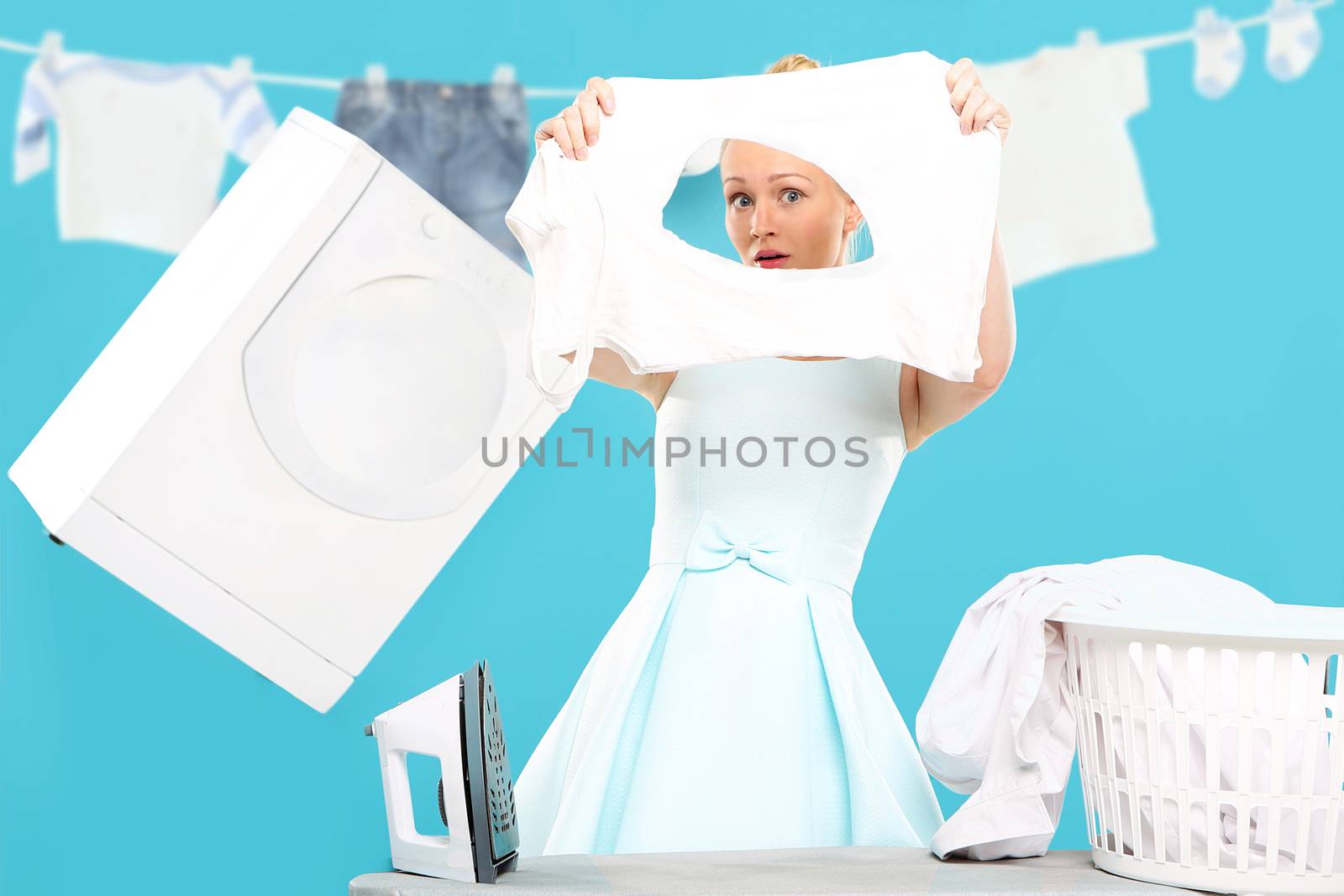 Laundry , hanging , sorting - happy woman running around the house by robert_przybysz