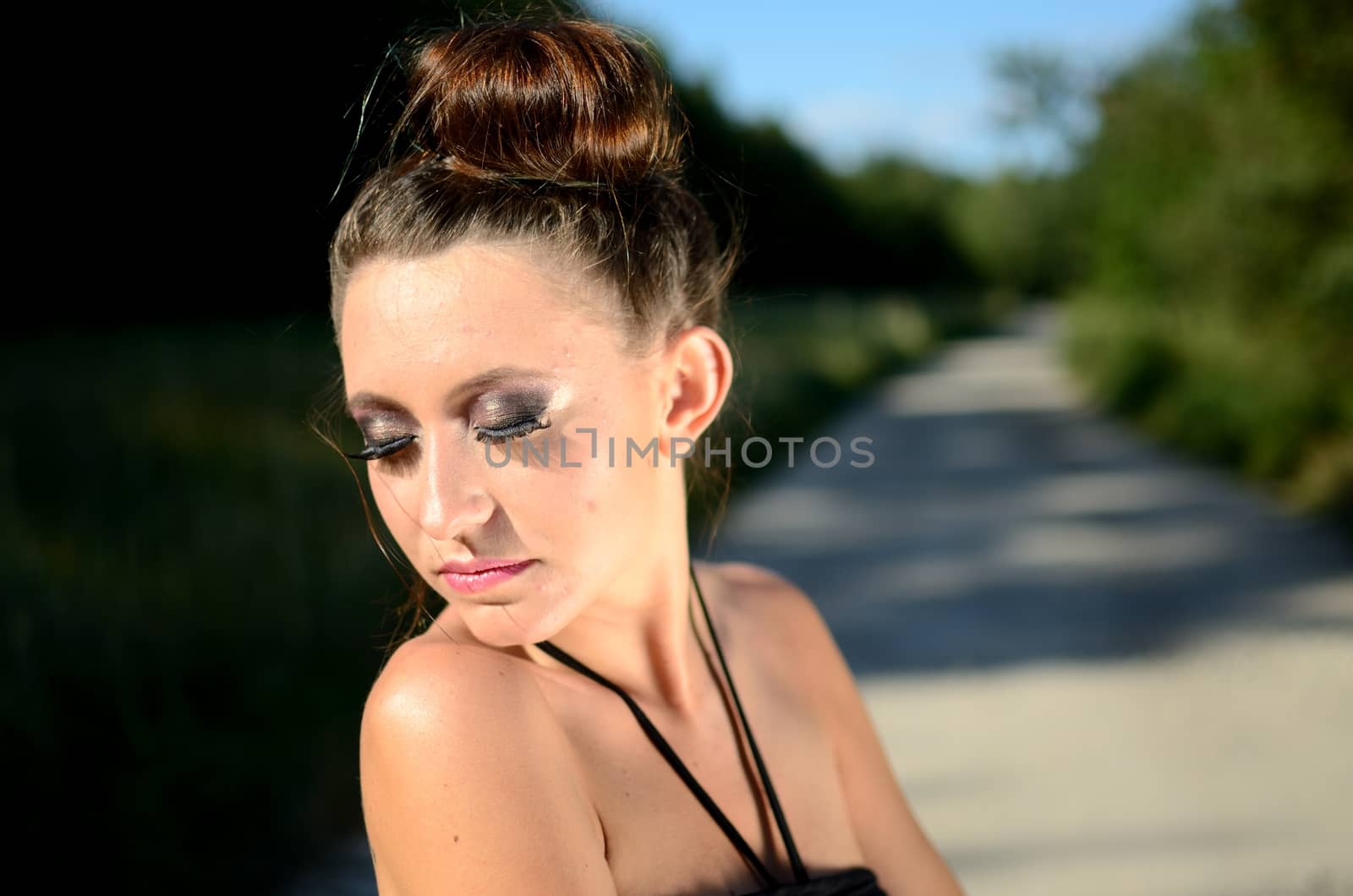 Outdoor photo of female model from Poland. Charming young girl closed her eyes, dreaming.