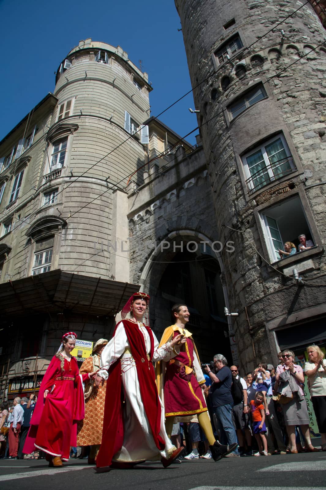 GENOA, ITALY - 8 JUNE 2014 - Unidentified people during the historical parade of the Maritime Republics Palio