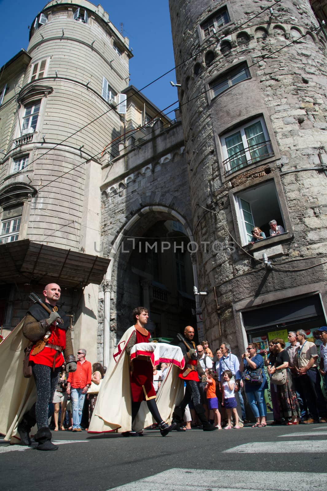 GENOA, ITALY - 8 JUNE 2014 - Unidentified people during the historical parade of the Maritime Republics Palio
