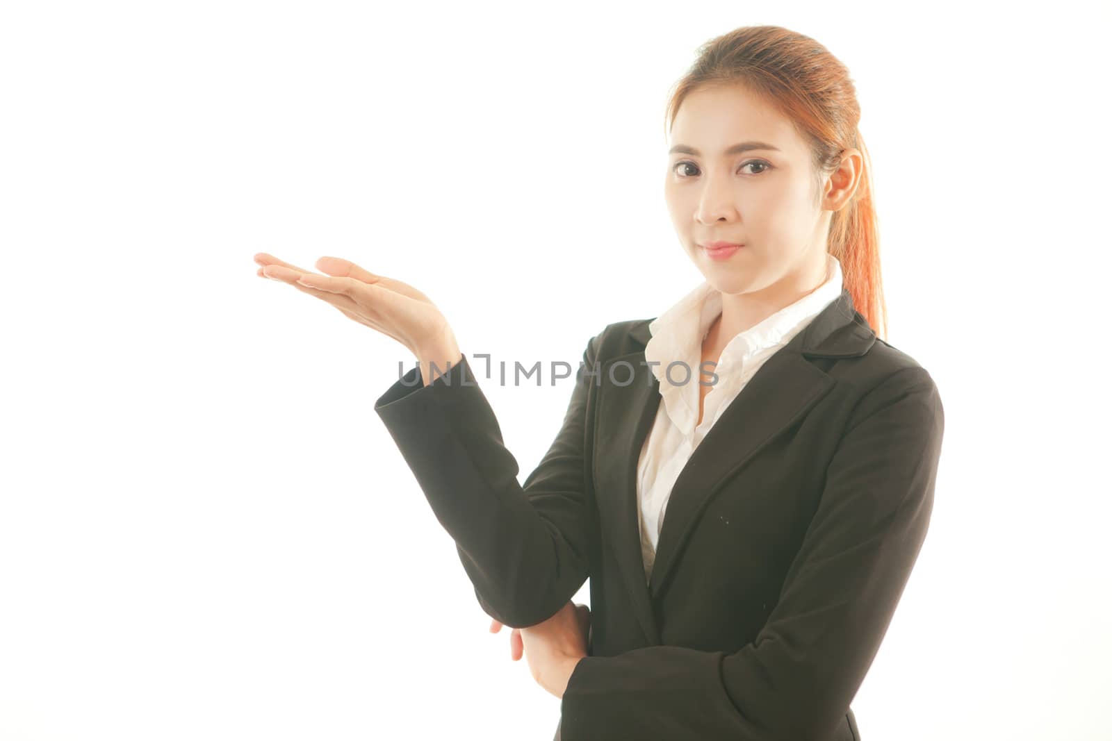 Business asian woman presenting a copyspace isolated on white background