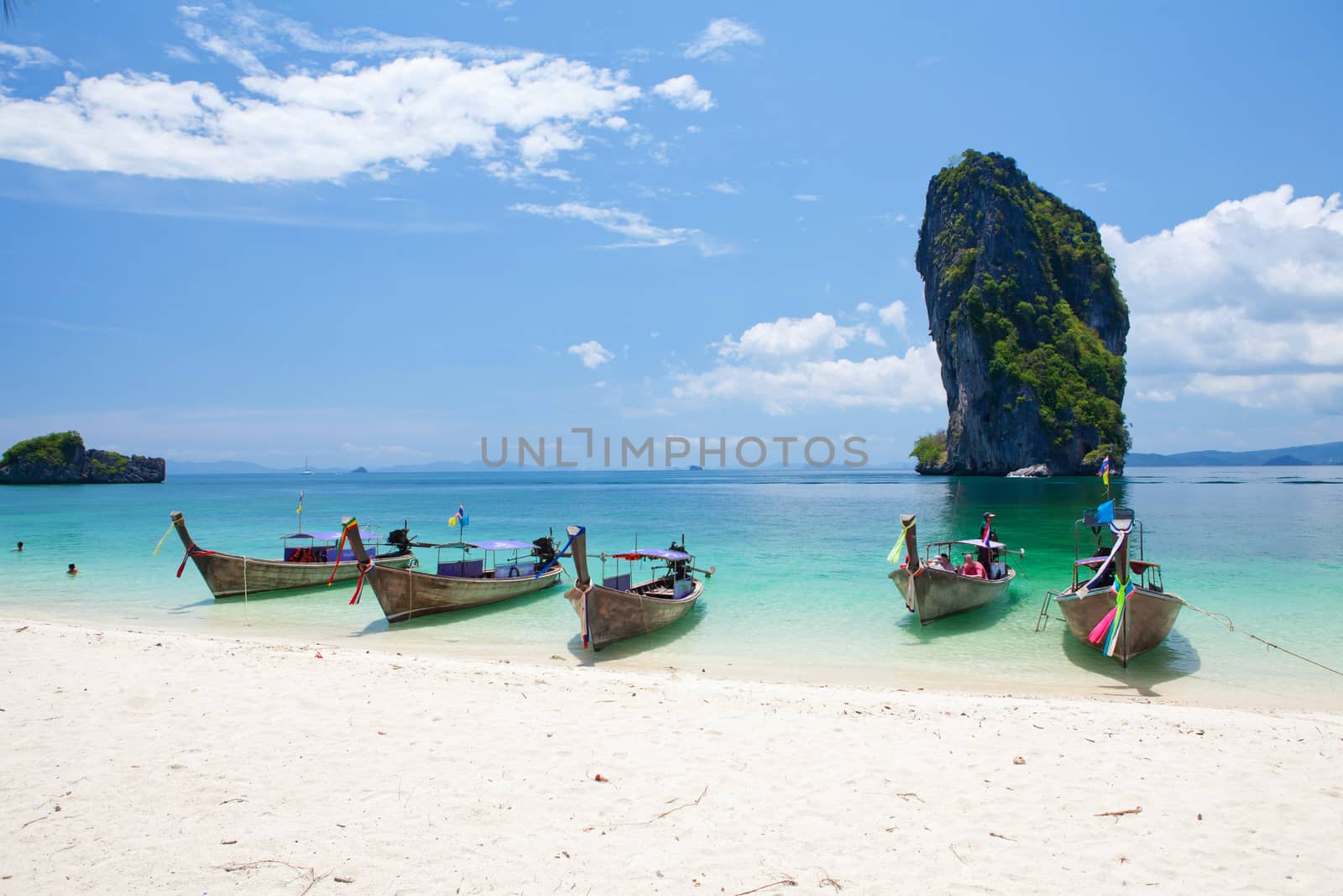 Cliff and boats and the clear sea Phi Phi Leh south of Thailand