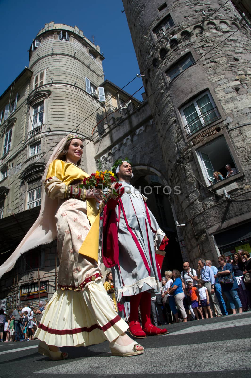 GENOA, ITALY - 8 JUNE 2014 - Unidentified people during the historical parade of the Maritime Republics Palio