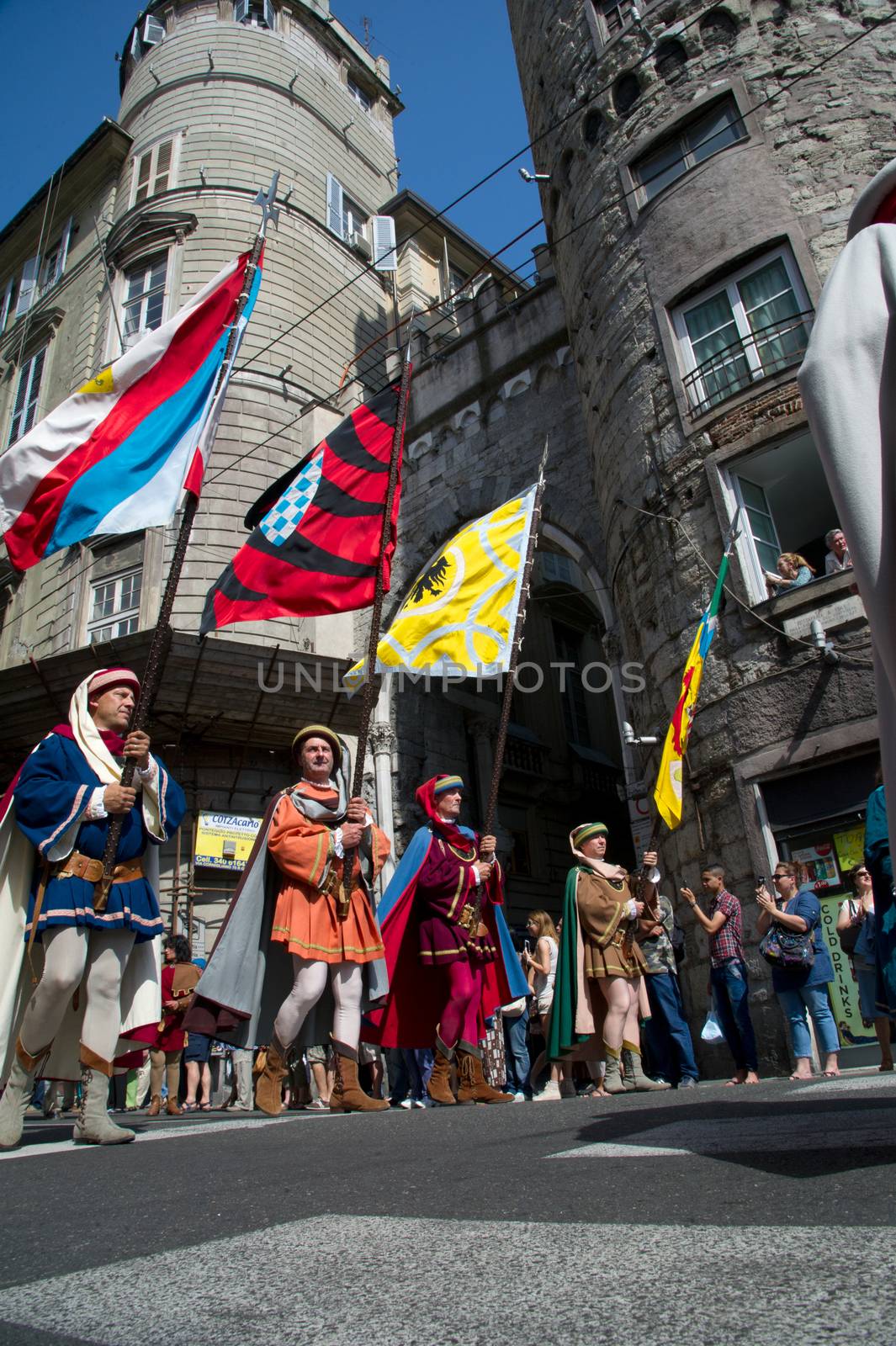 GENOA, ITALY - 8 JUNE 2014 - Unidentified people during the historical parade of the Maritime Republics Palio
