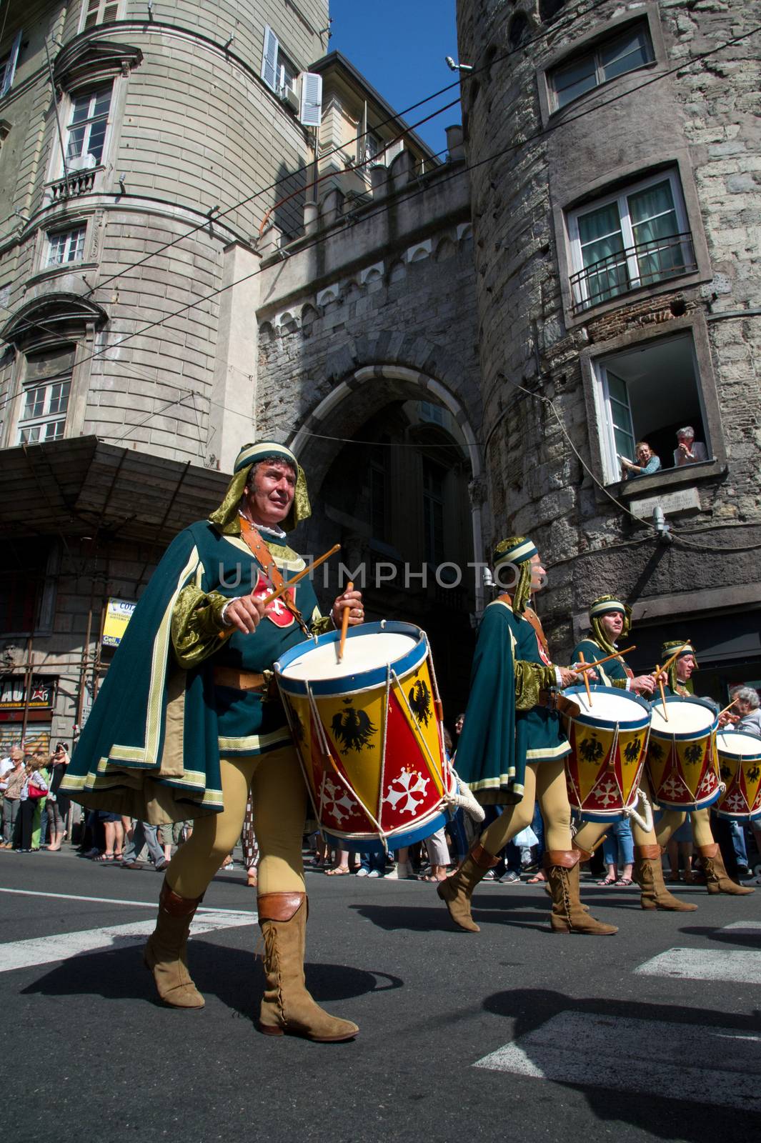 GENOA, ITALY - 8 JUNE 2014 - Unidentified people during the historical parade of the Maritime Republics Palio