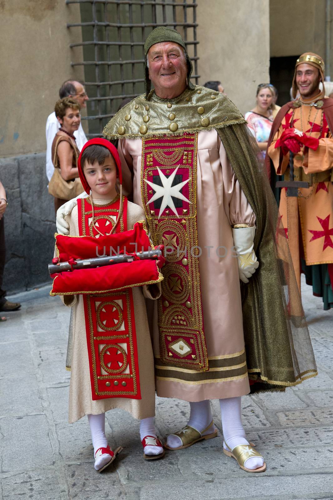GENOA, ITALY - 8 JUNE 2014 - Unidentified people during the historical parade of the Maritime Republics Palio