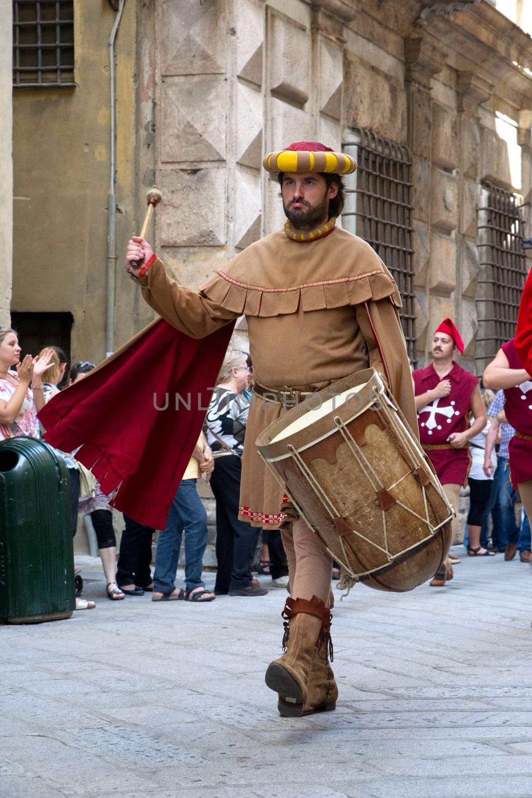 GENOA, ITALY - 8 JUNE 2014 - Unidentified people during the historical parade of the Maritime Republics Palio