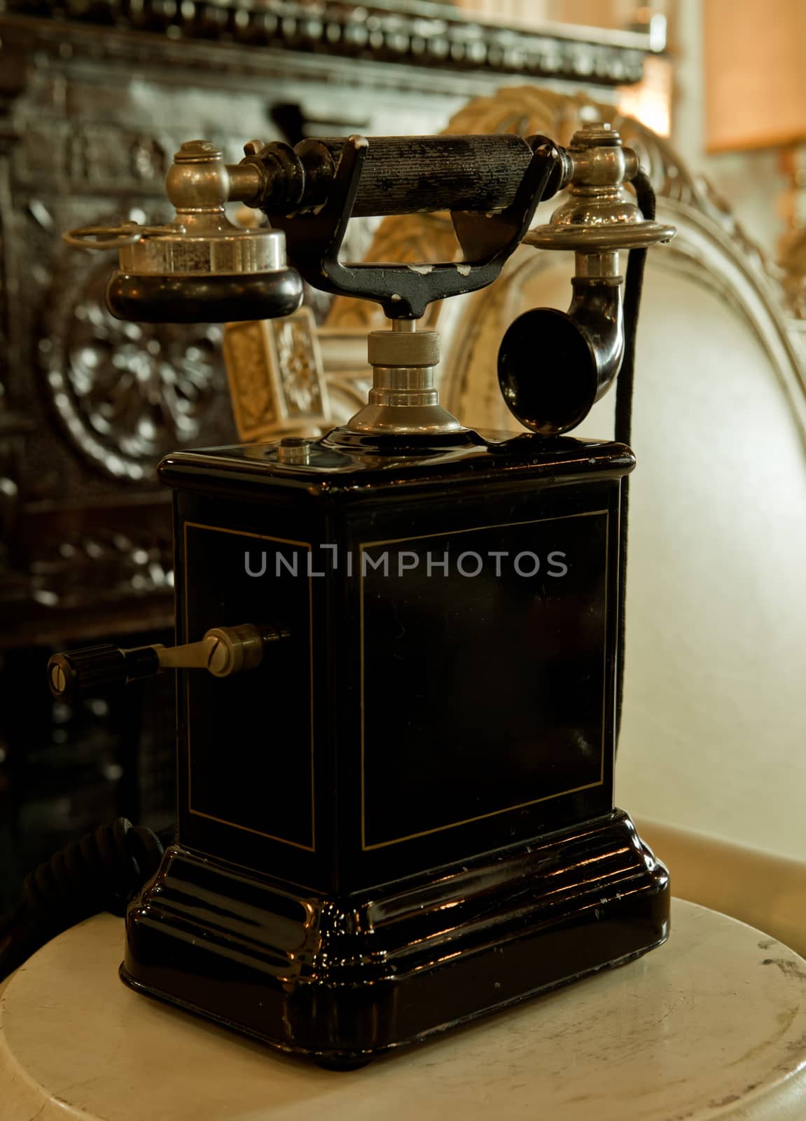 vintage telephone on the table by witthaya