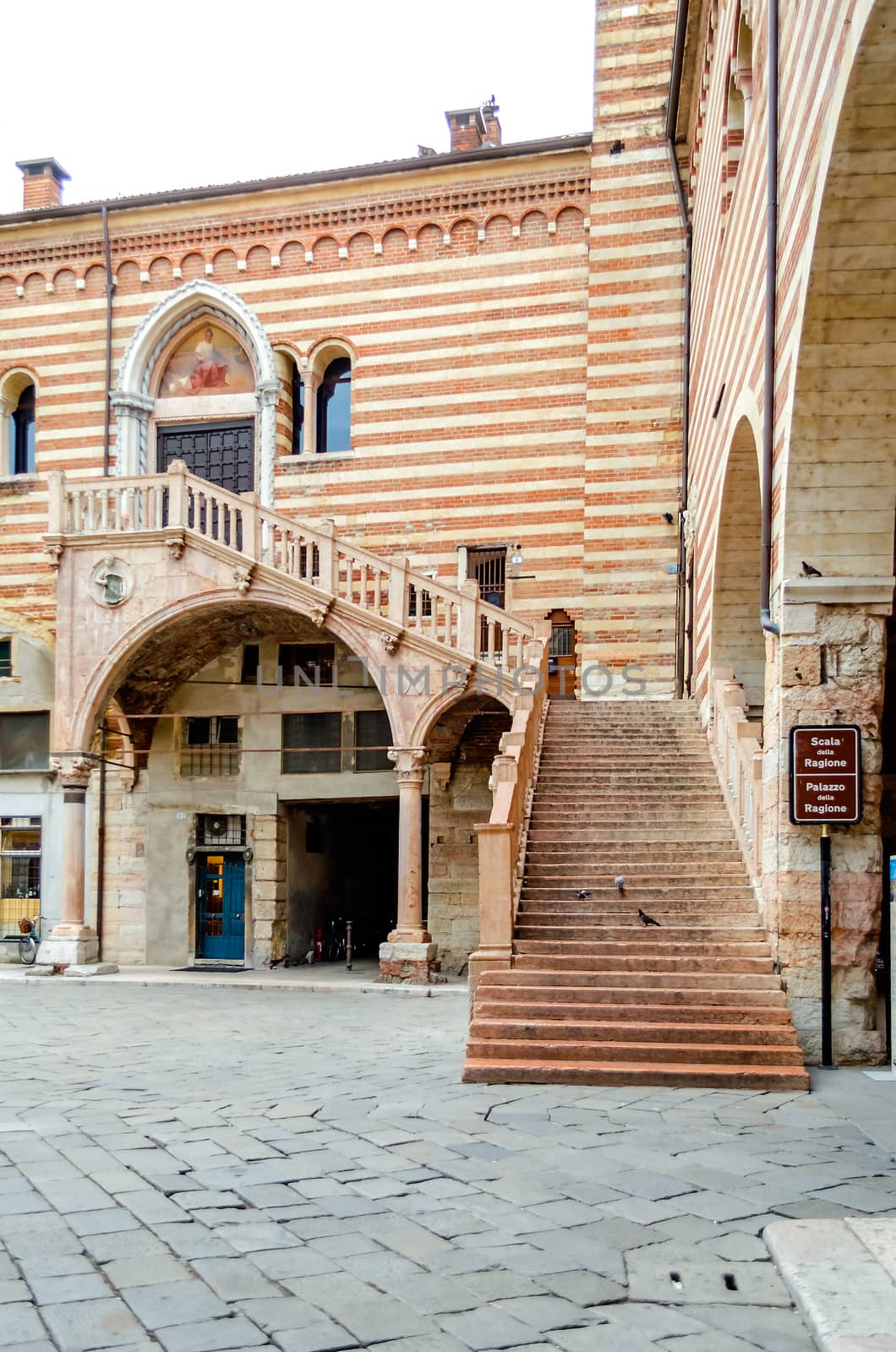 Famous Stairs called Scala della Ragione at Palazzo della Ragione, Verona, Italy