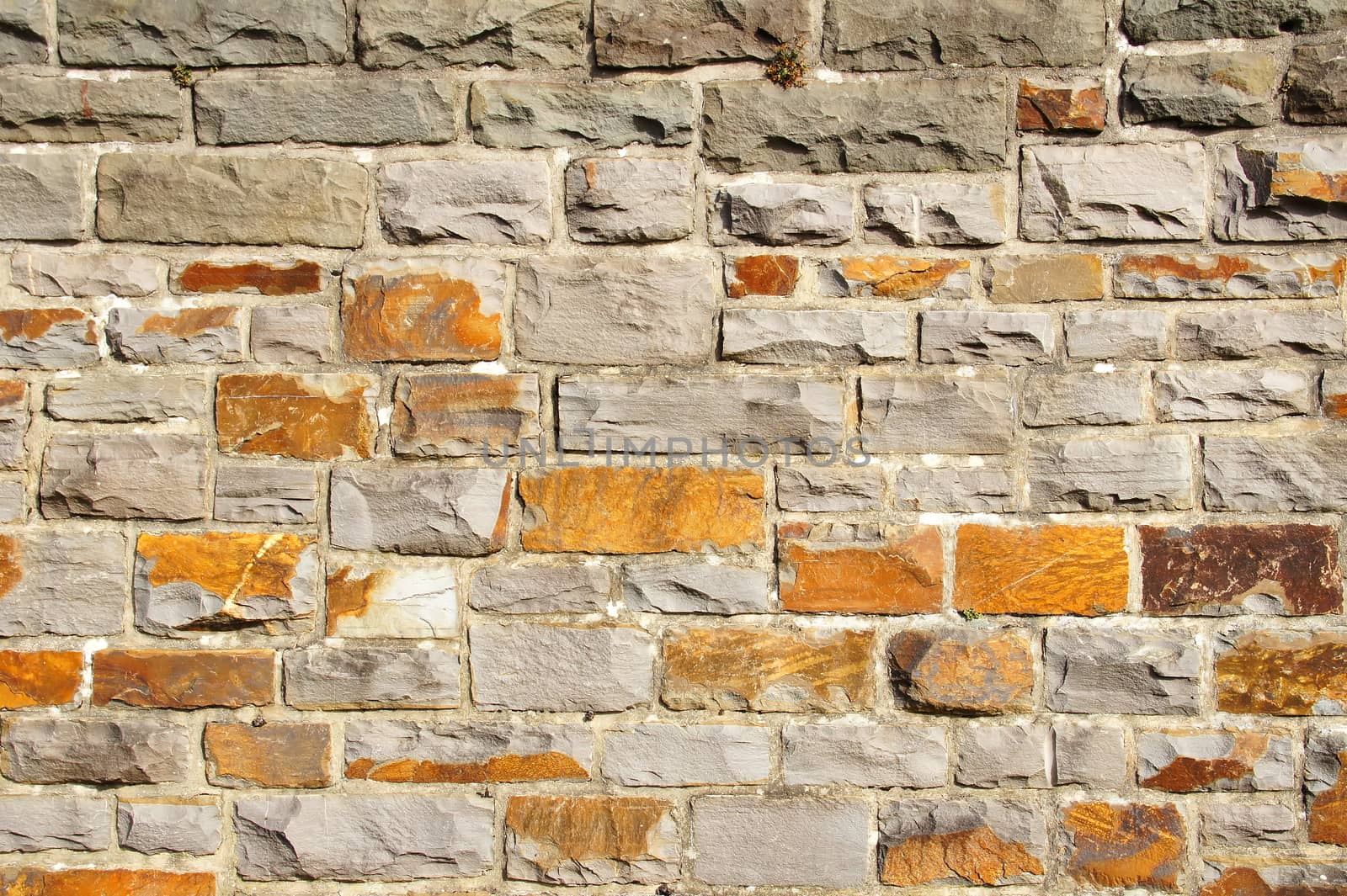 Mauer Struktur in grau und orange
