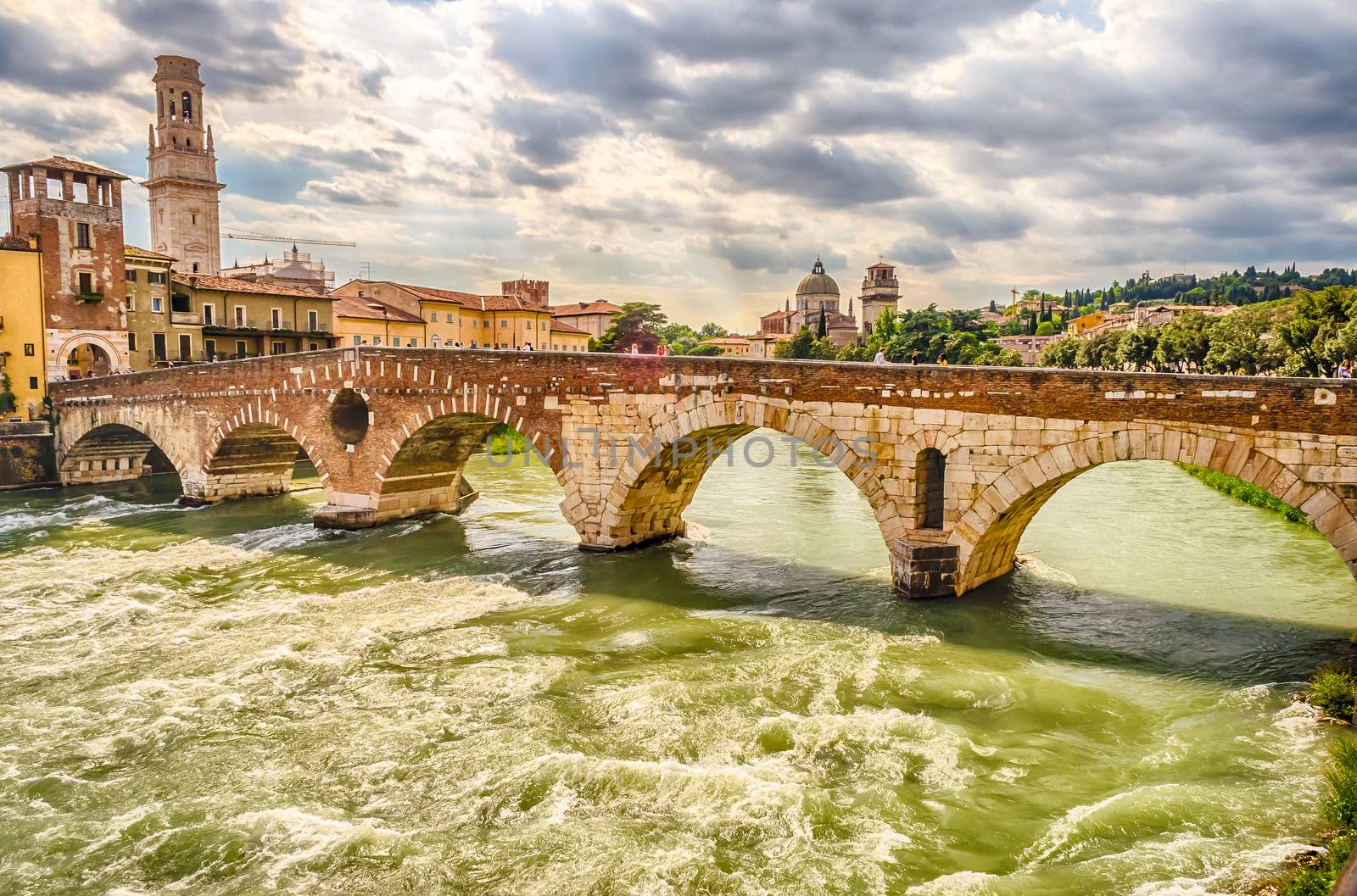Ancient Roman Bridge called Ponte di Pietra above the Adige River in Verona, Italy