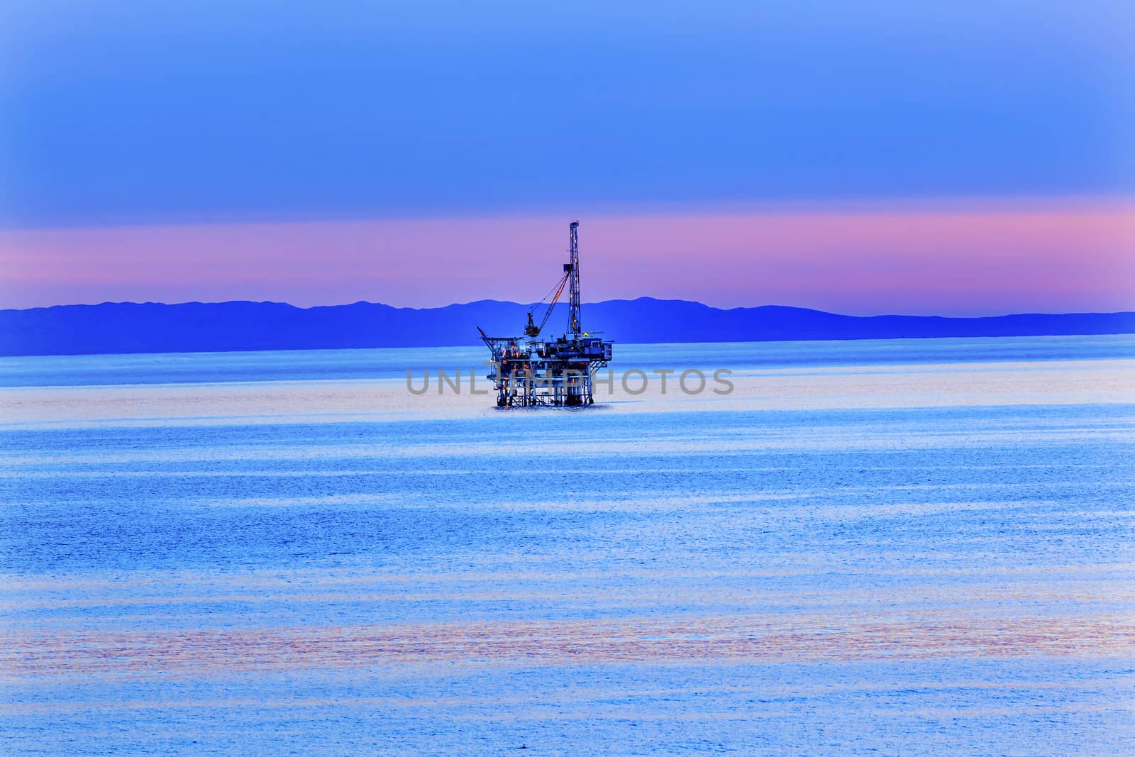 Ellwood Oil Well Offshore Platforms Coastline Pacific Oecan Pink Sunset Goleta California 