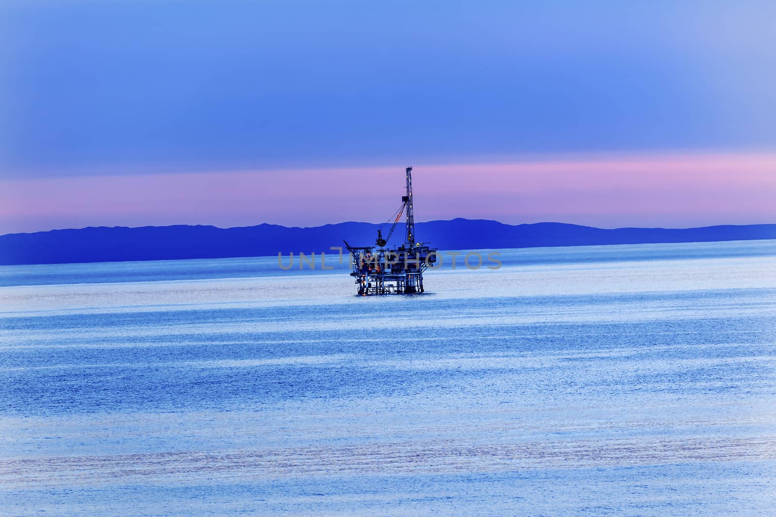 Ellwood Oil Well Offshore Platforms Coastline Pacific Oecan Pink Sunset Goleta California 