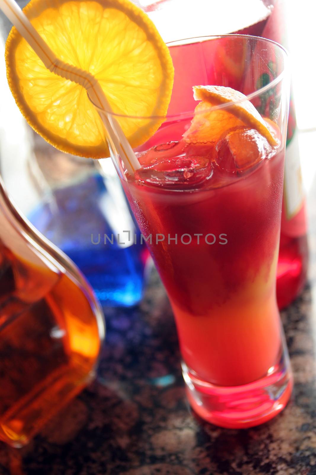 Colored drink in a glass for cocktails