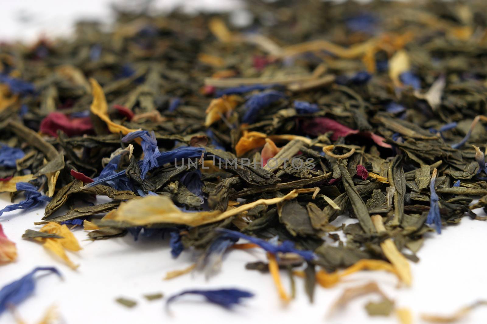 The composition of the color of tea, white background, close-up