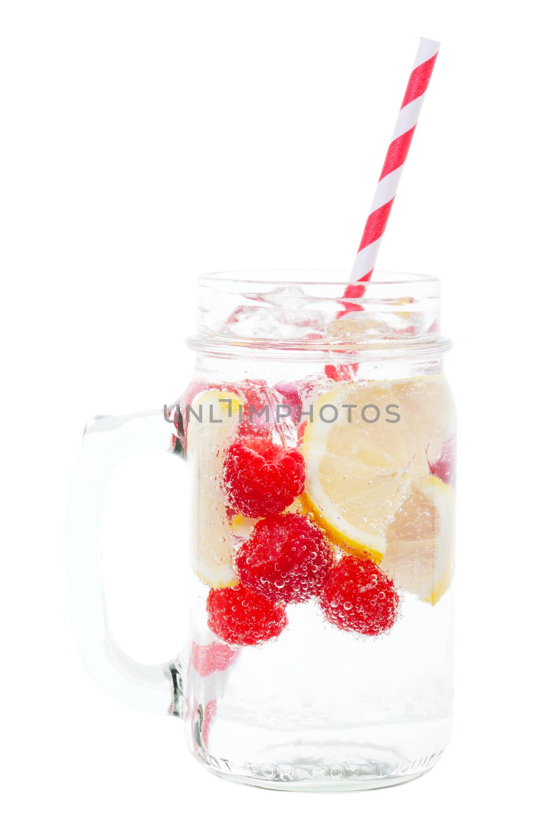 Ice cold sparkling water over ripe fresh fruit make for a healthy and thirst quenching beverage on a hot summer day.  Includes clipping path.