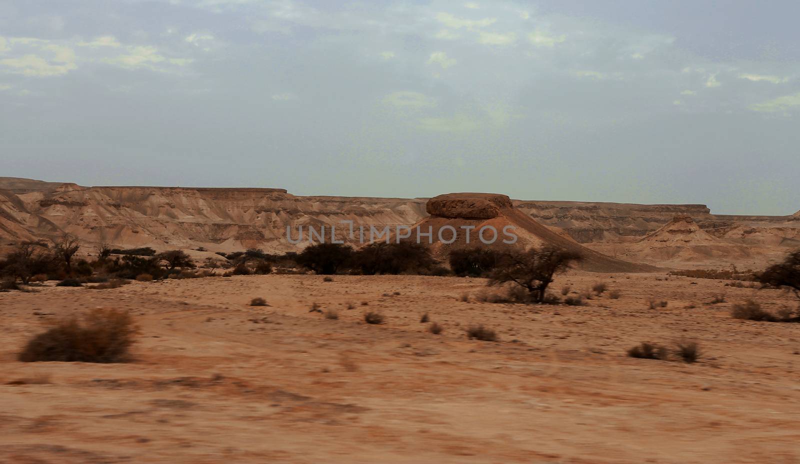 An Egyptian Desert And Mysty Sky in the daylight