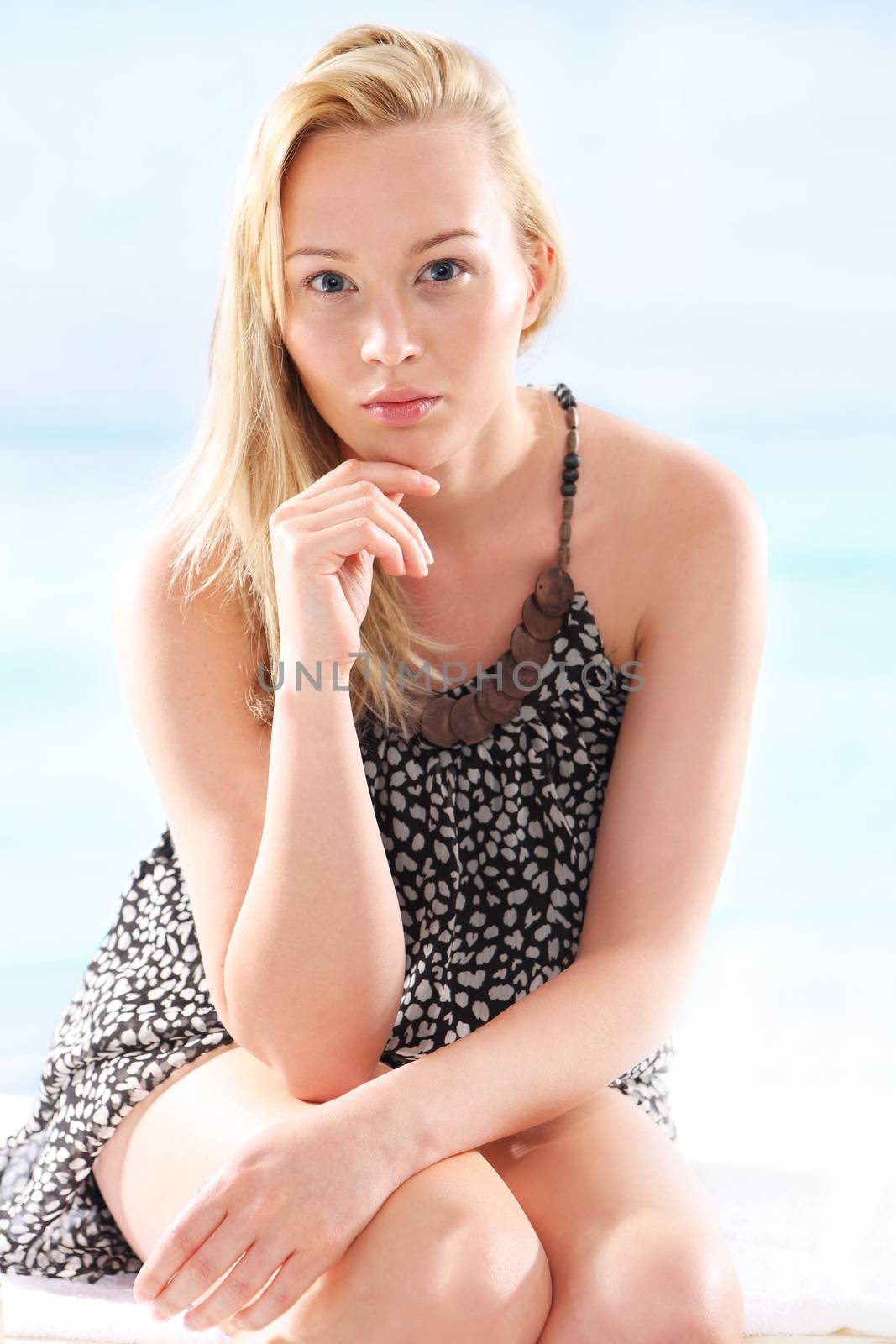 A woman resting on the beach