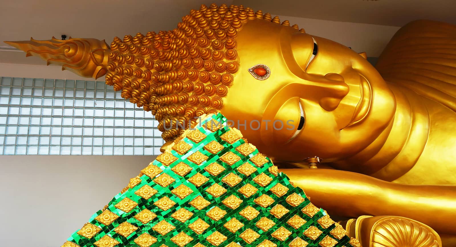 Sleeping Buddha, a beautiful golden enshrined in the temple in the capital of Thailand.                             