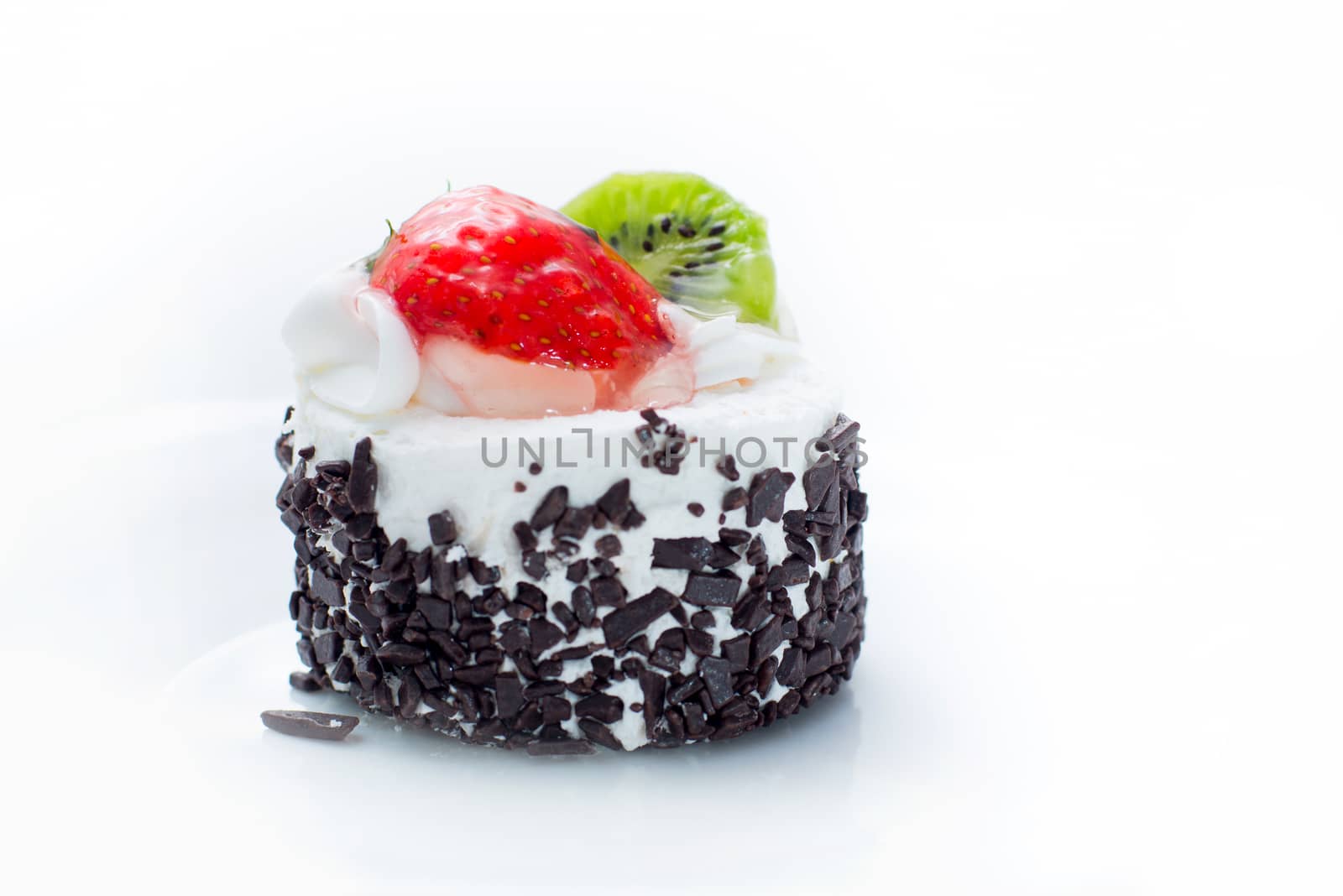 cake with strawberries and kiwi on a white background