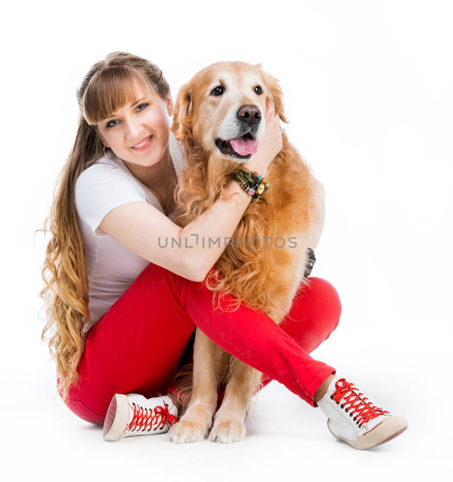 cute girl with her red retriever isolated on a white background