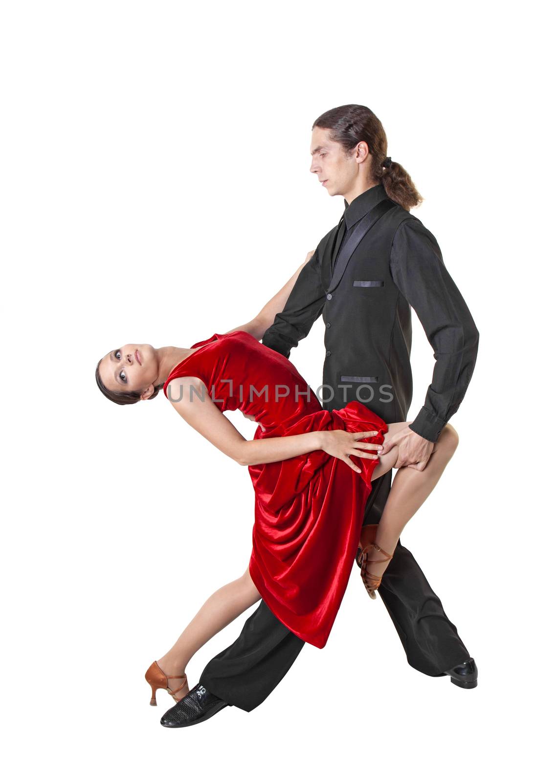 Young couple dancing tango isolated over white