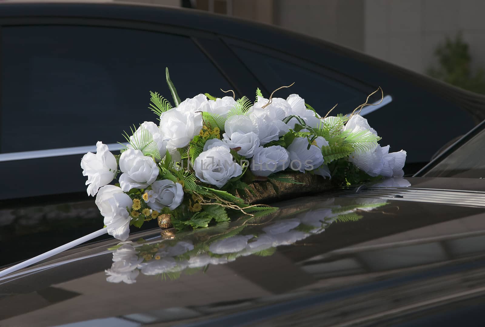 Artificial roses, wedding decoration of a car
