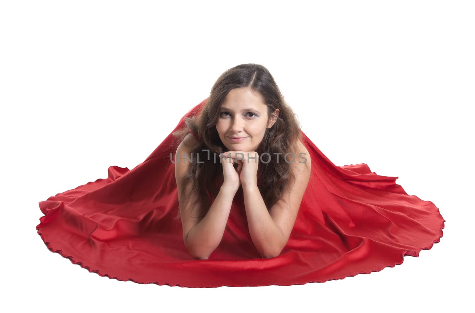 Beautiful woman sitting on the floor, white background
