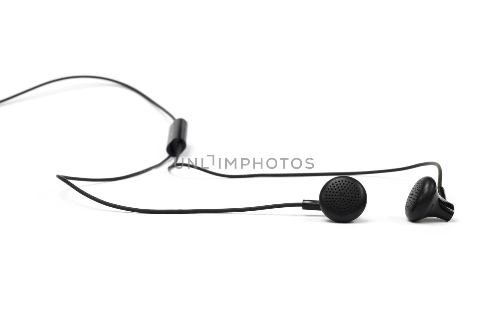 isolated white bac kground  black earphones by ZONETEEn