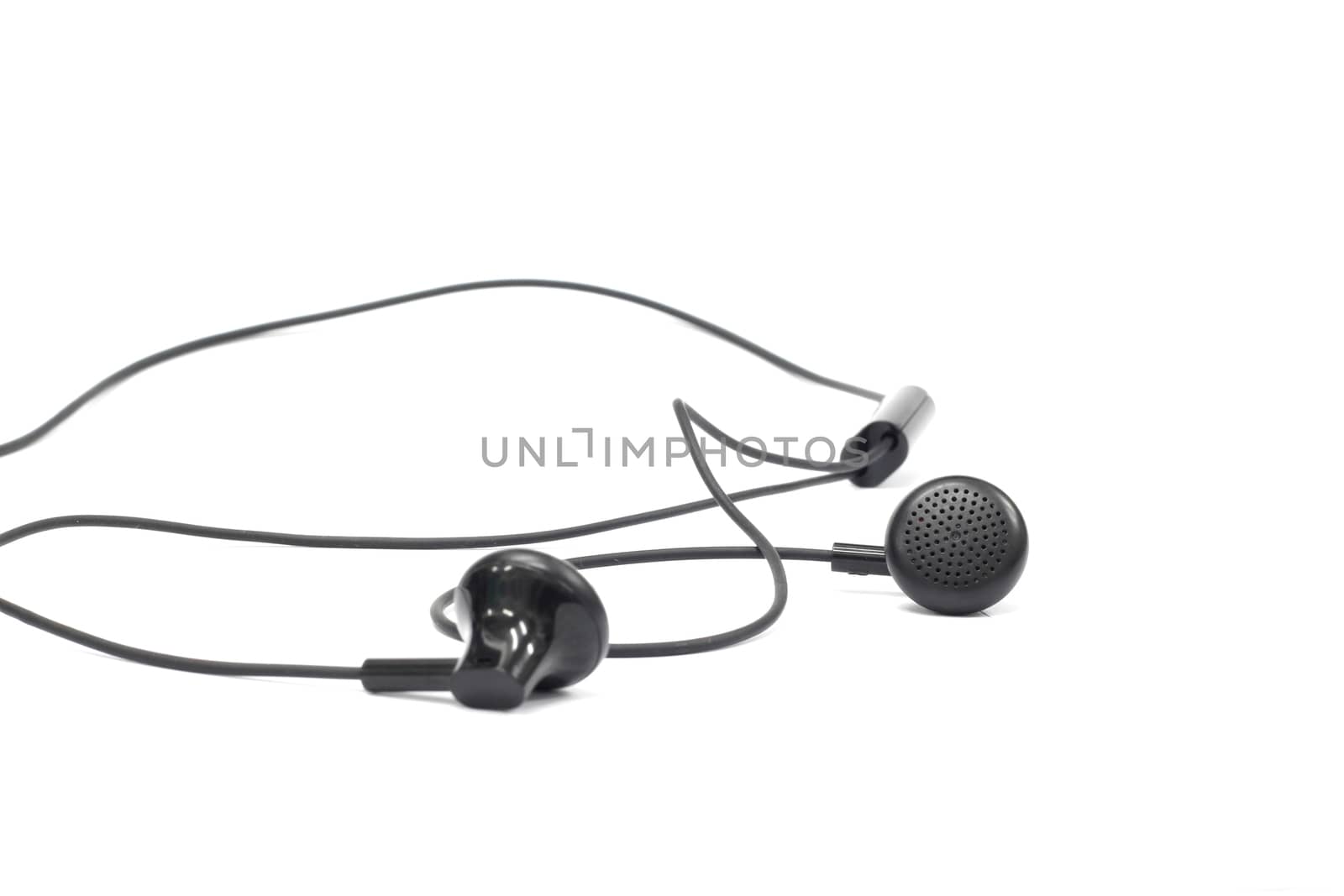 isolated white bac kground  black earphones by ZONETEEn