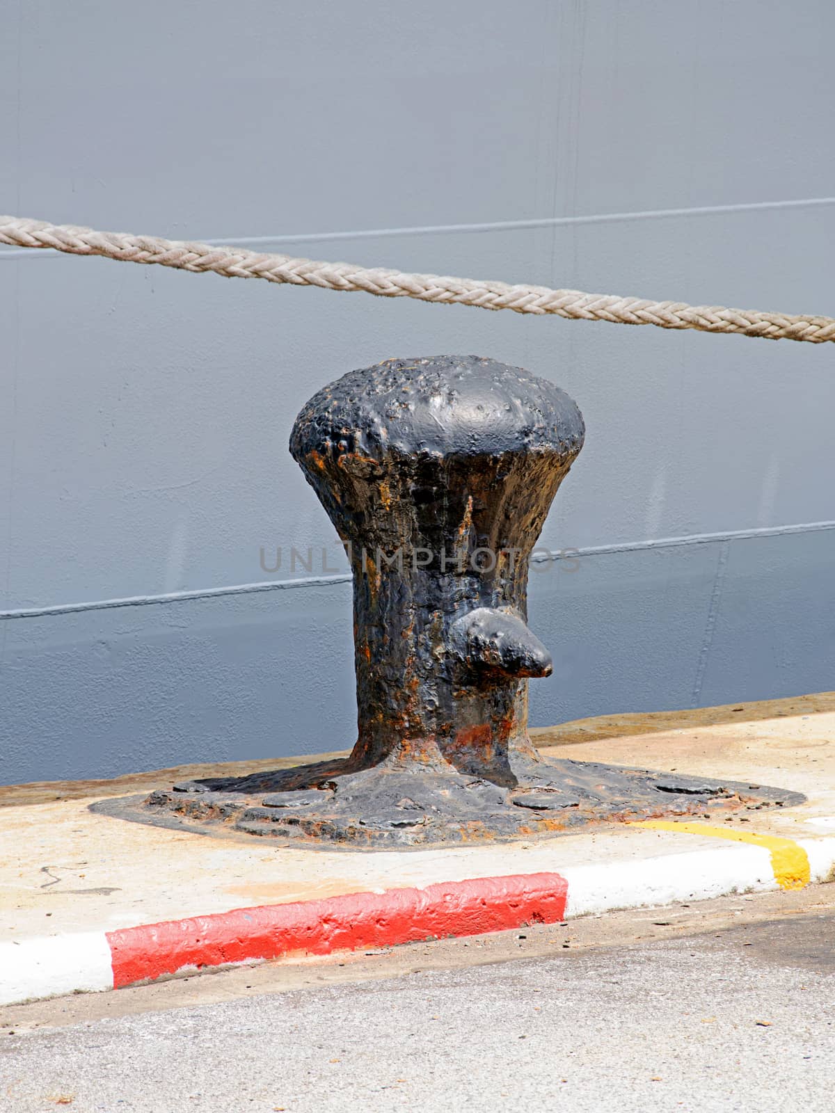 Old bollard on a harbor