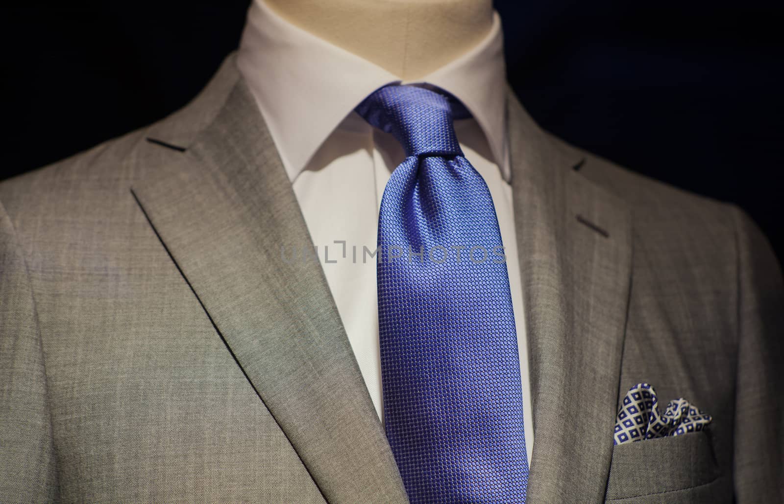 Close up of male suit exposed in the clothes shop
