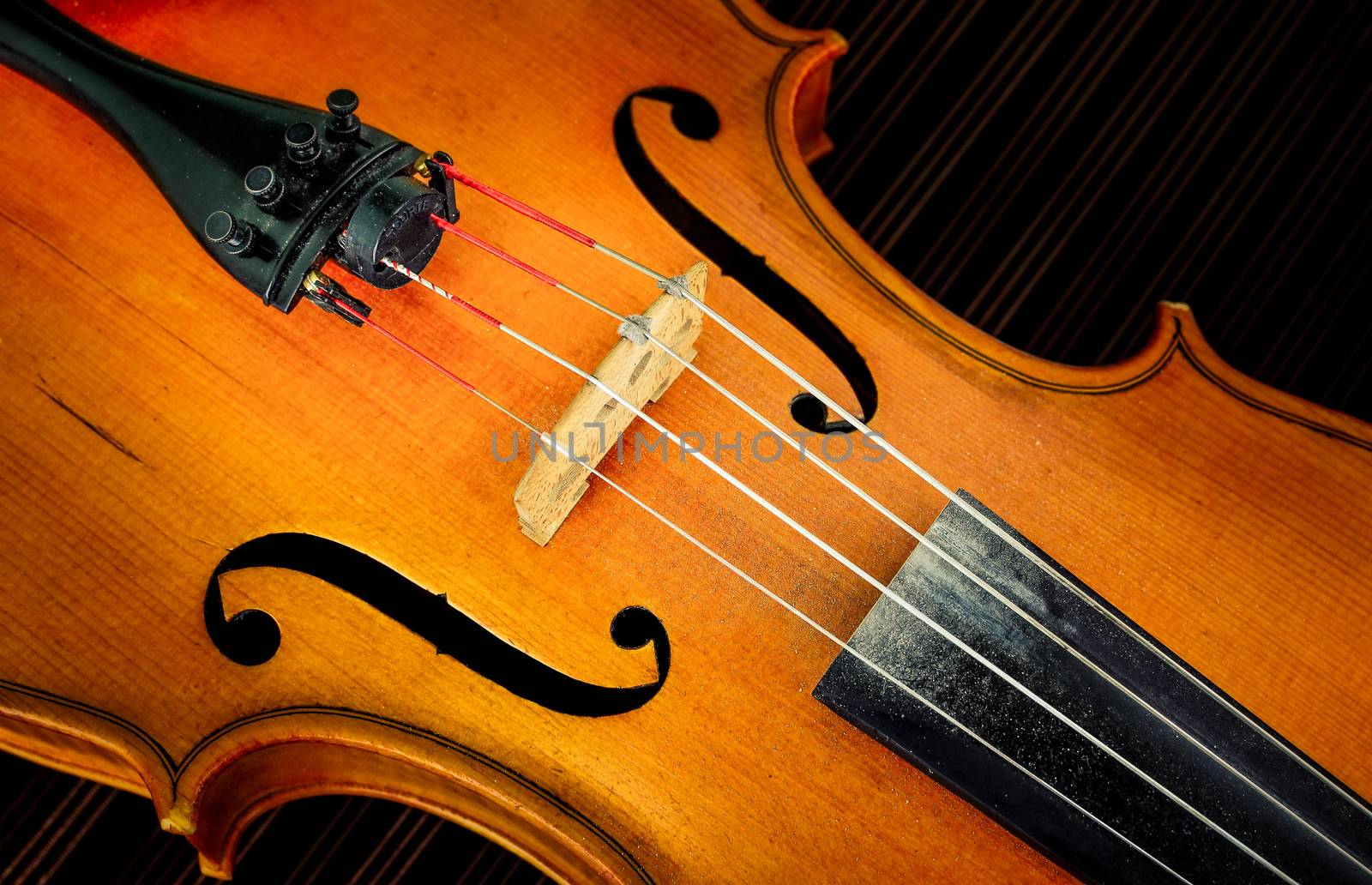 Detail of violin in filtered glow style by martinm303