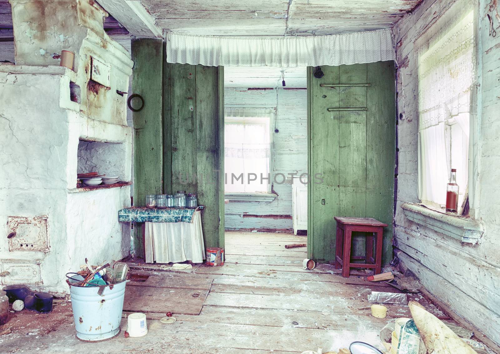 Old small abandoned and ruinous country house interior  in Russia
