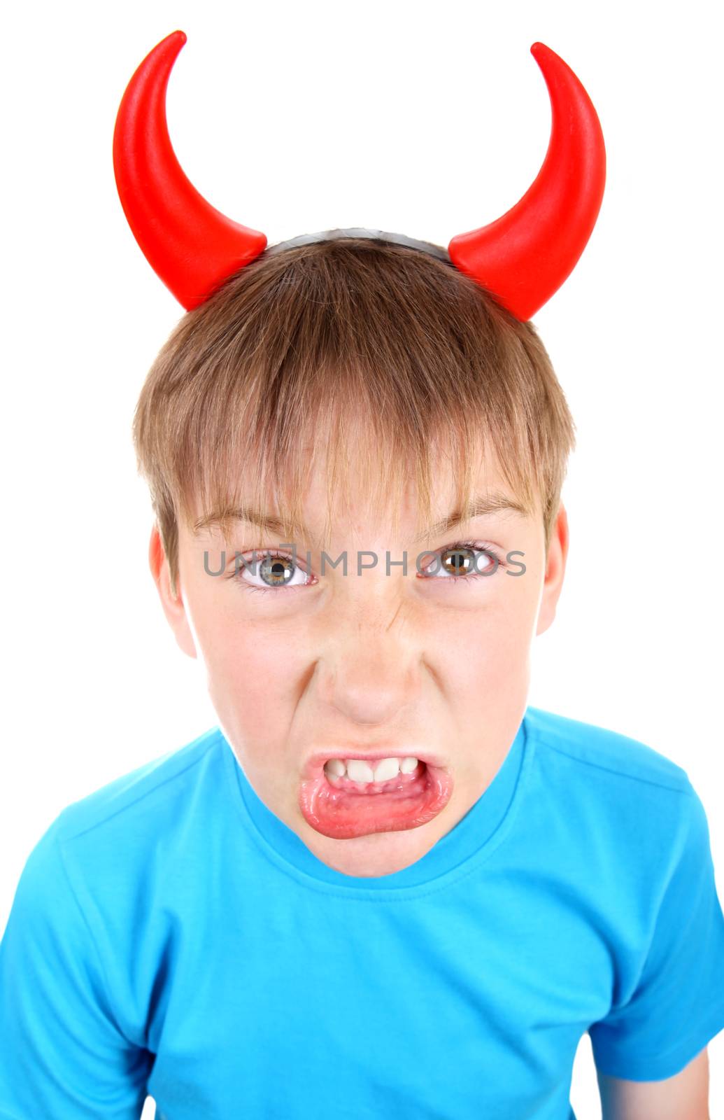 Angry and Naughty Kid with Devil Horns on the Head Isolated on the White Background