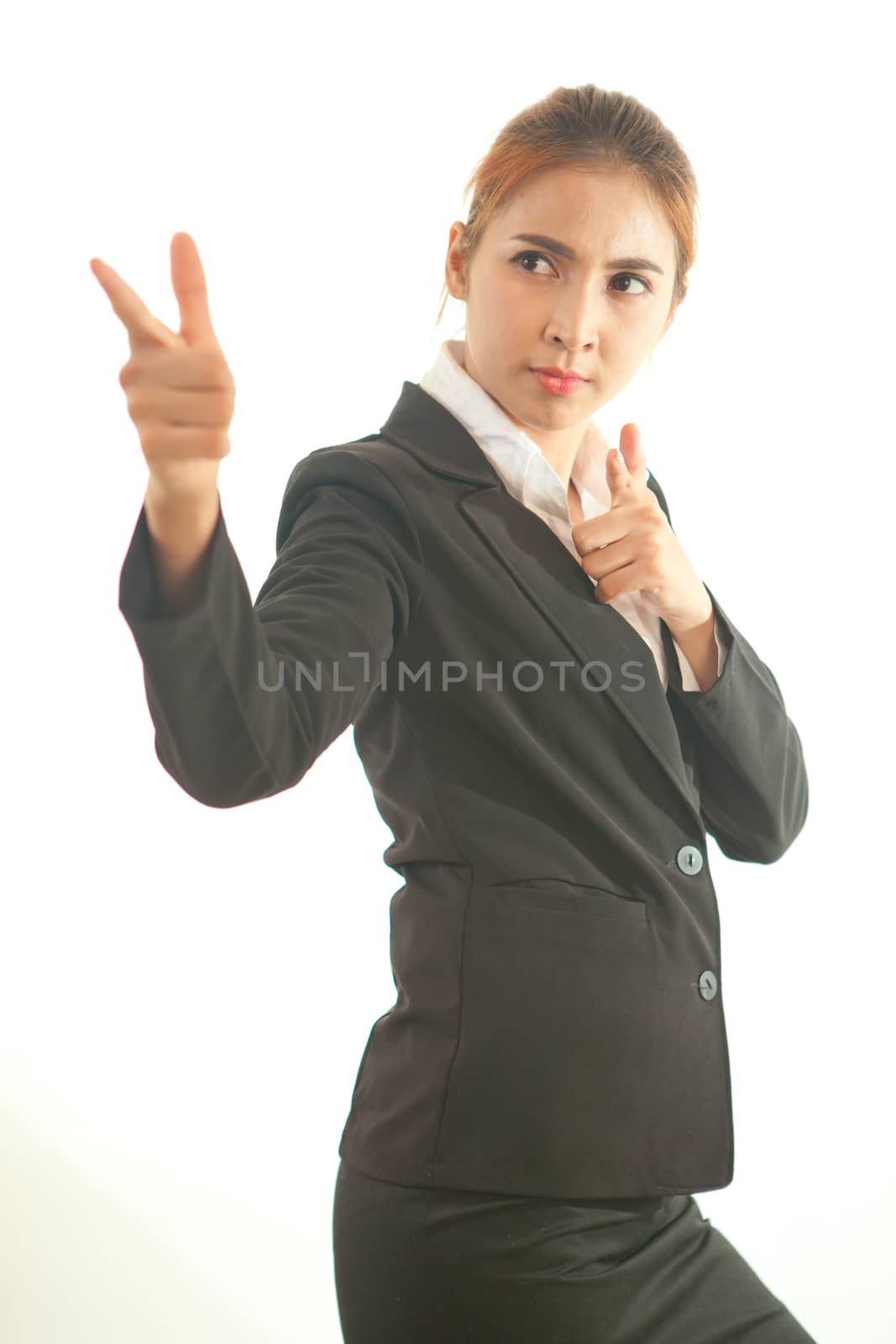 Boxing business asian woman punching towards camera isolated on white background