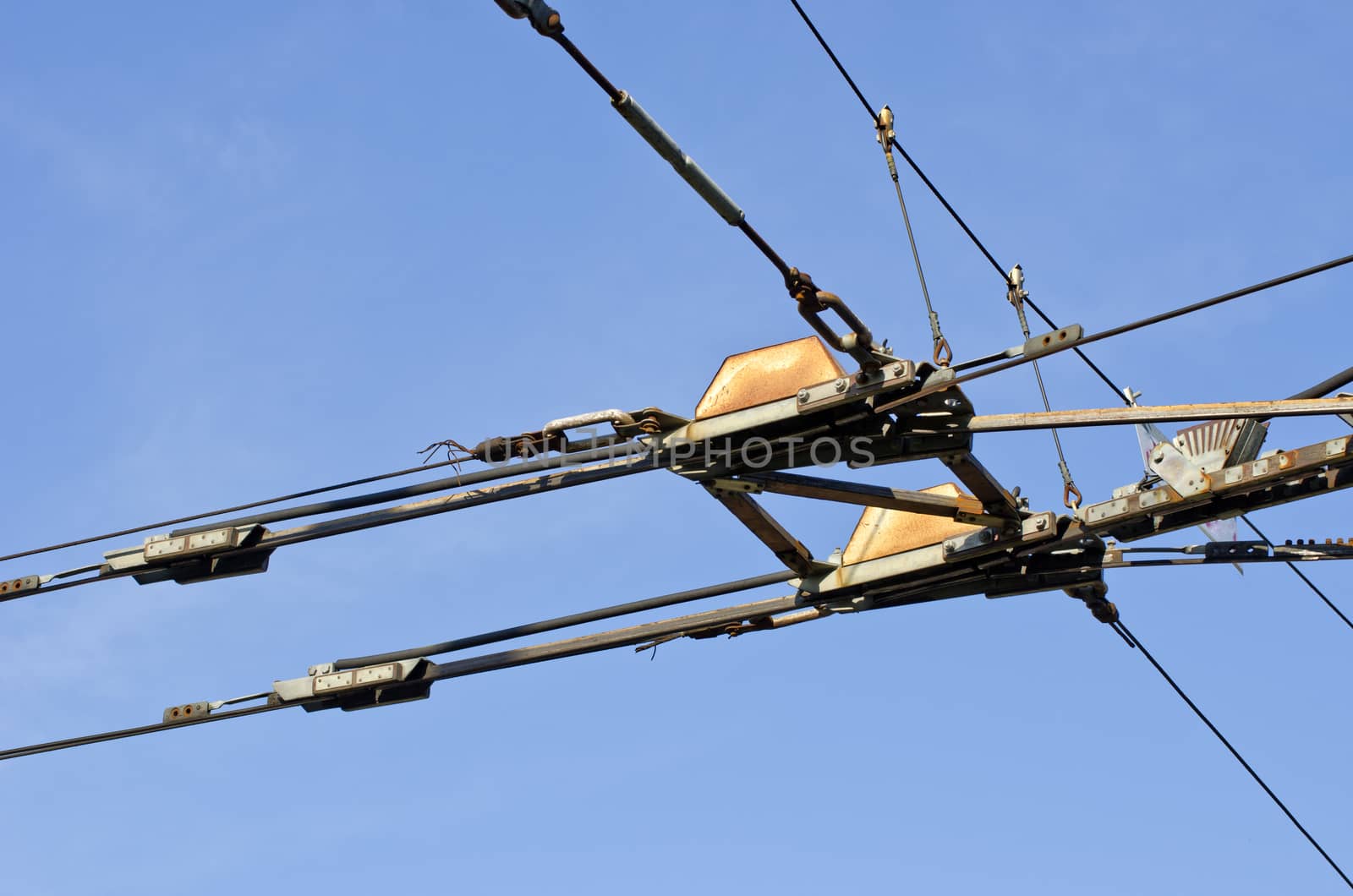 trolley trolleybus electricity cable construction on sky background