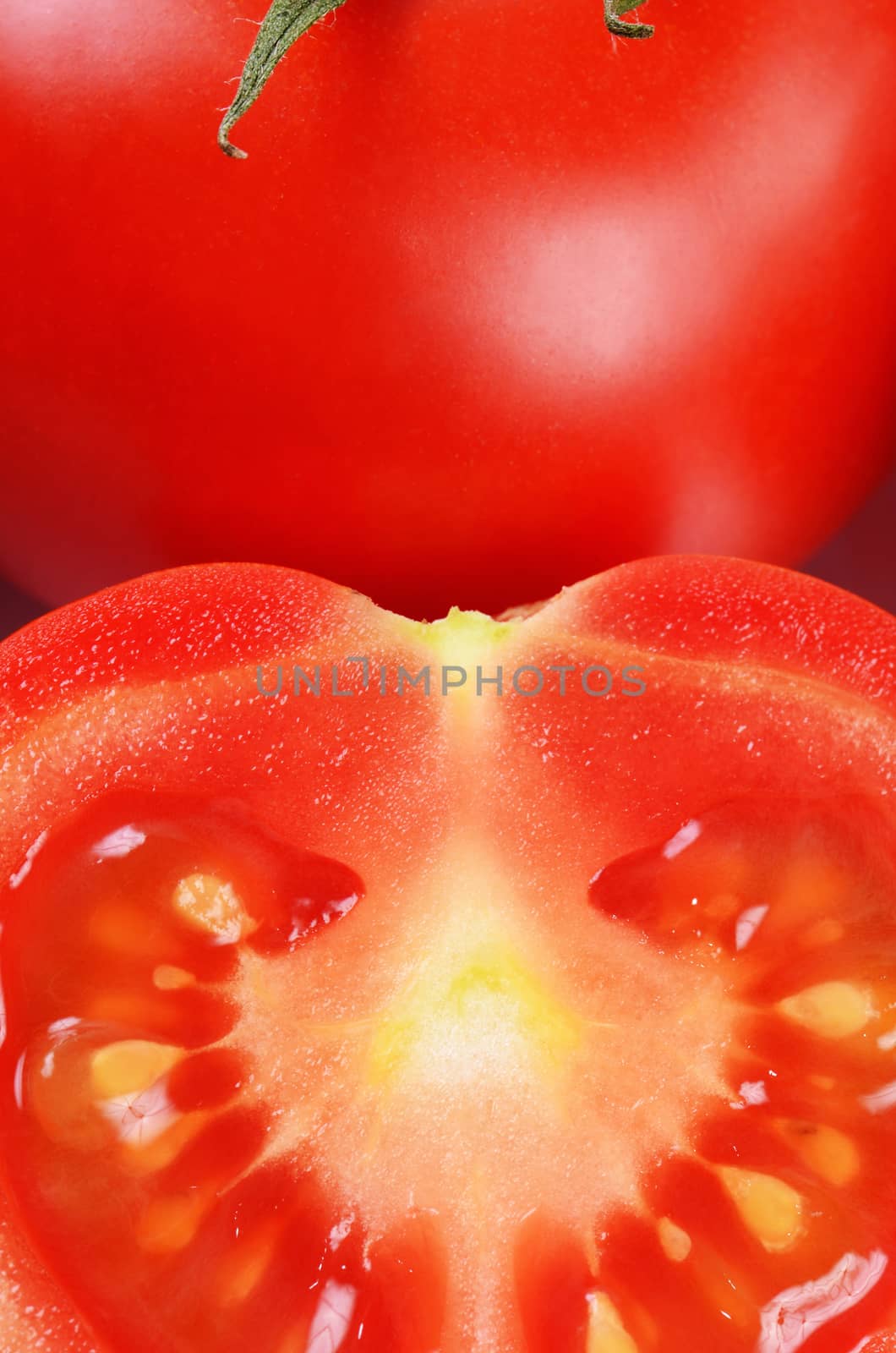 The red fresh tomatoes cut. Close up