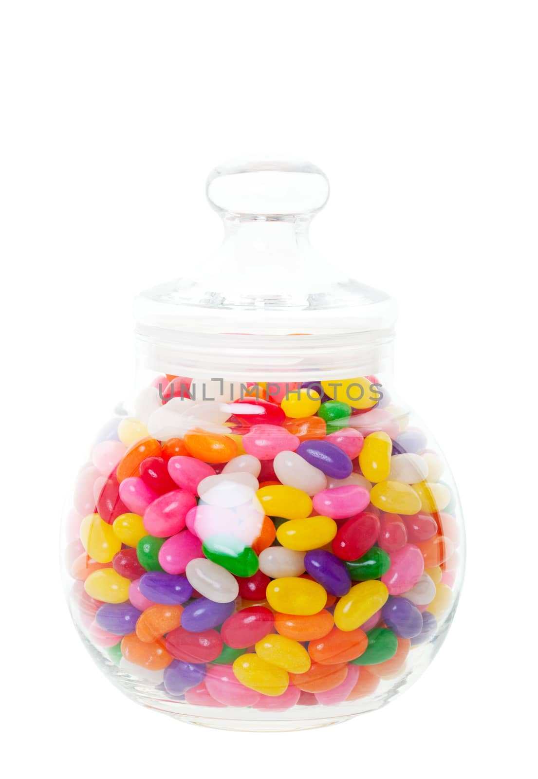 A candy jar full of jelly beans.  Shot on white background.