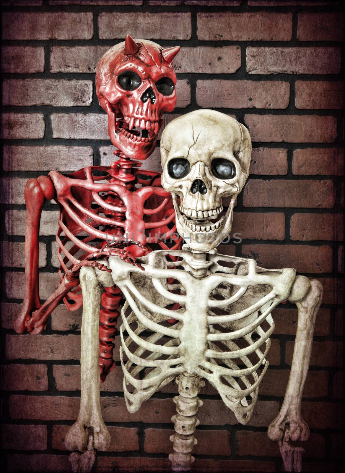An innocent skeleton with the devil riding on his shoulder trying to tempt him to do something evil.