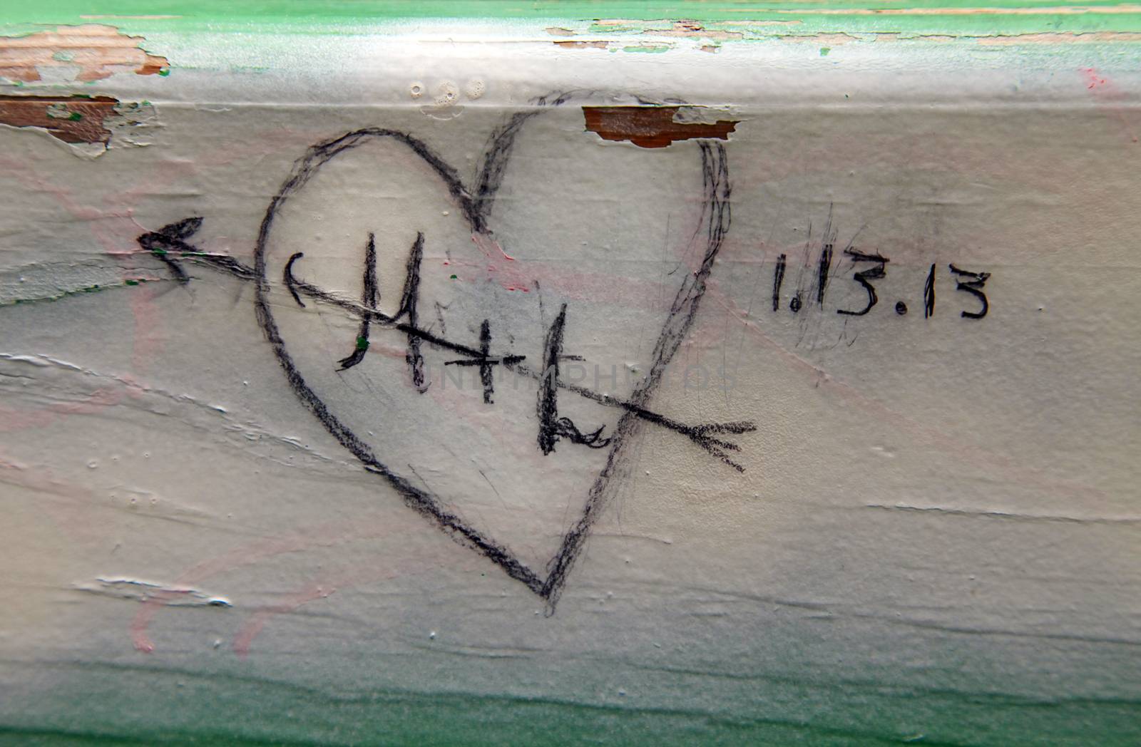 heart painted on a wooden bench