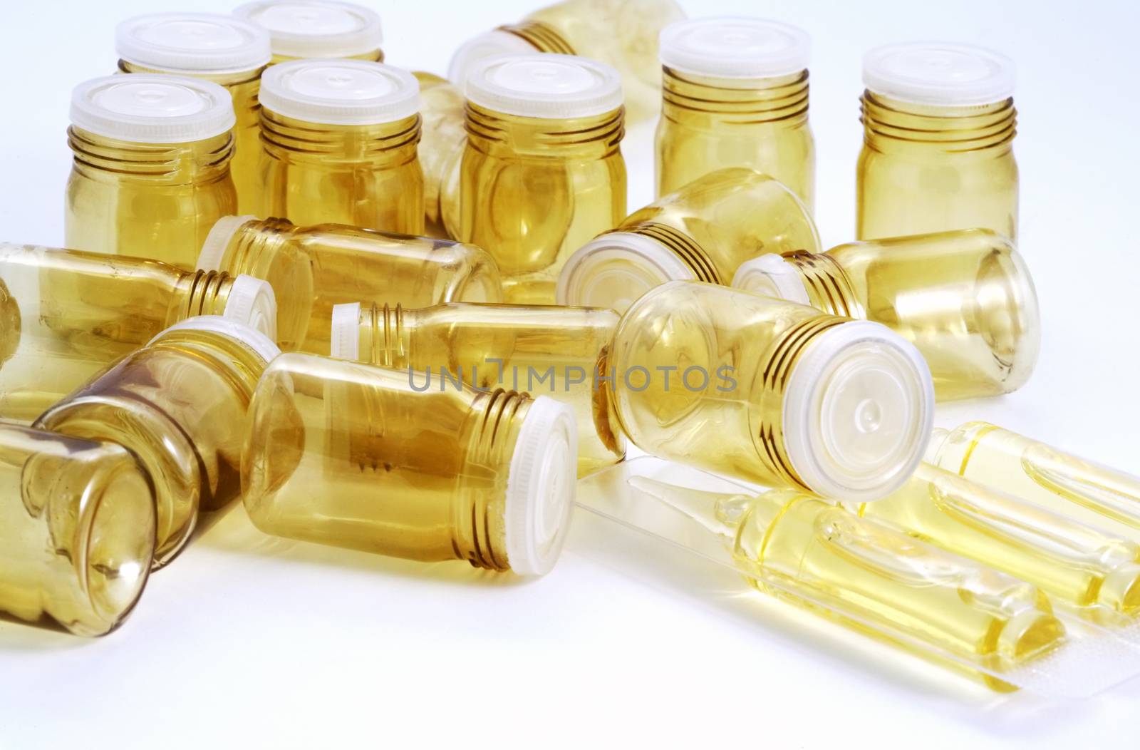 Empty pill bottles isolated on white background